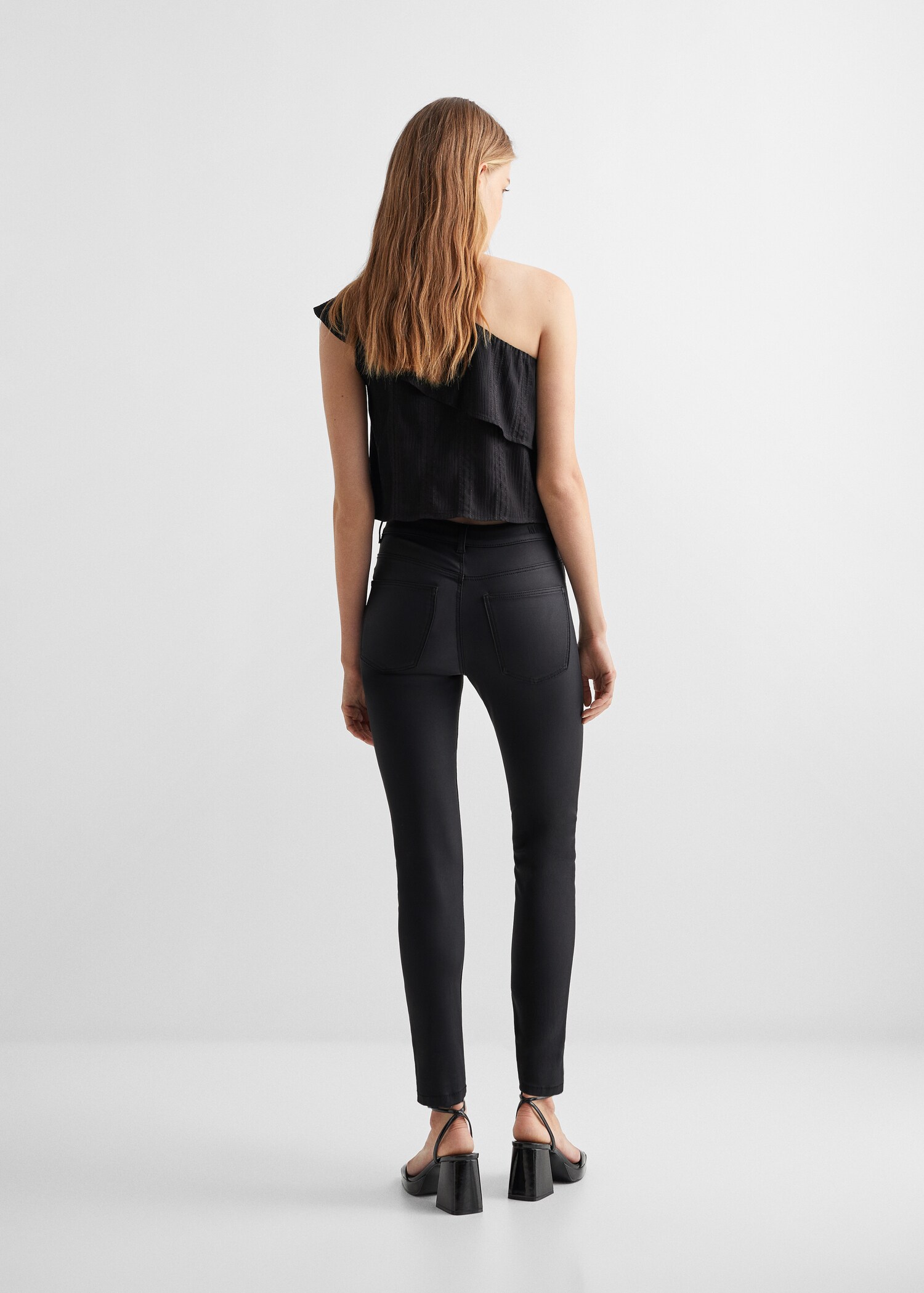 Jeans skinny encerados - Reverso del artículo