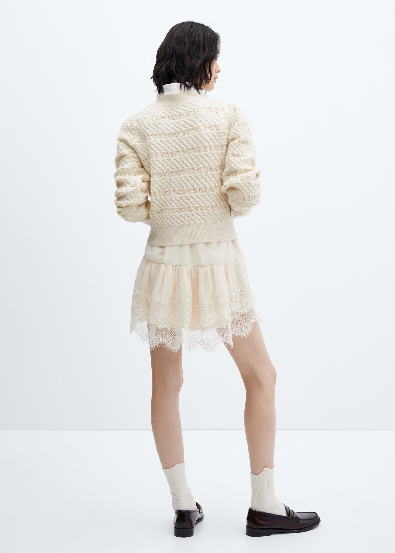 Knitted braided sweater - Reverse of the article