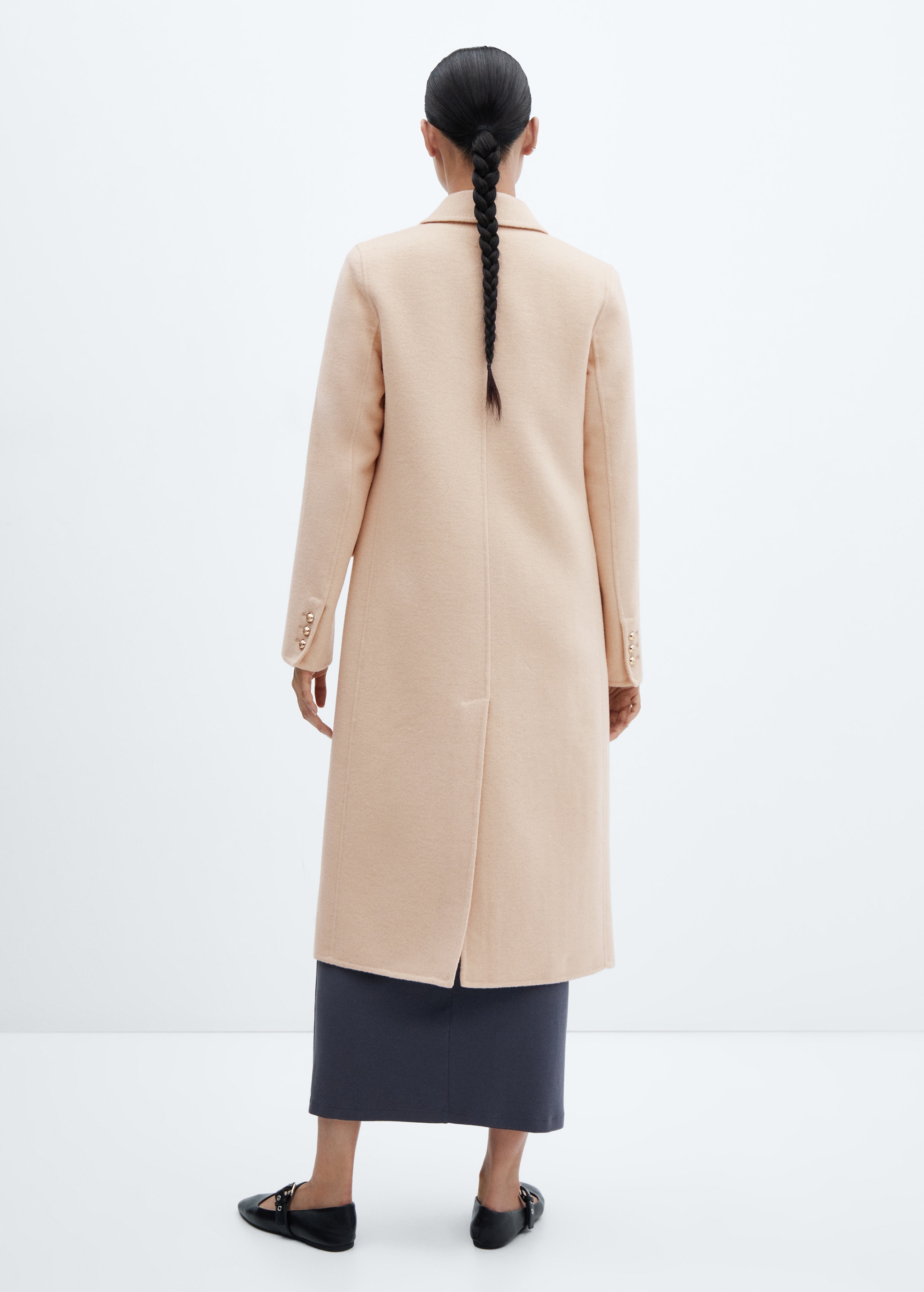 Handmade buttoned wool coat - Reverse of the article