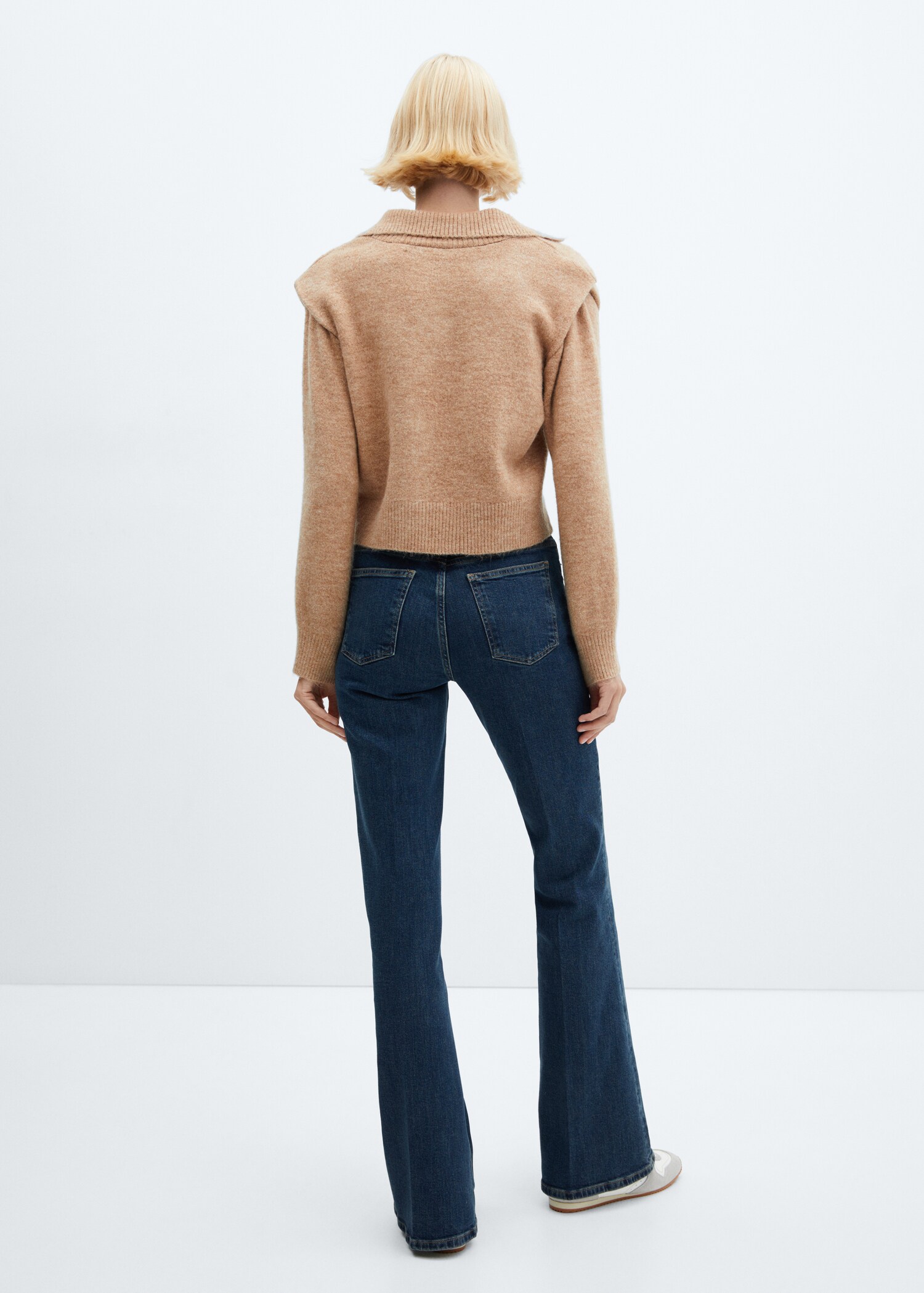 Polo-neck sweater with shoulder pads  - Reverse of the article