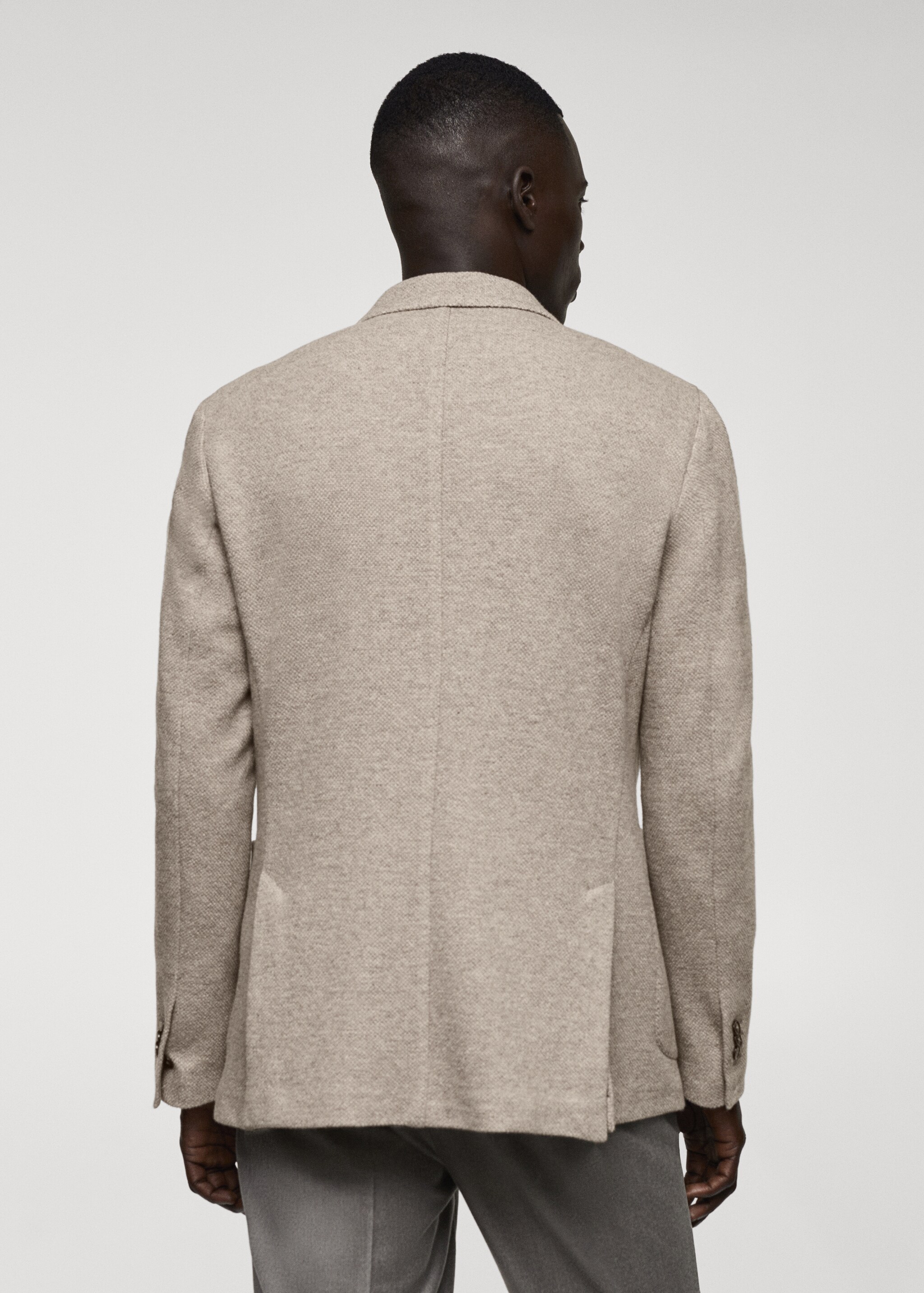 Трикотажный пиджак из чистой шерсти  - Обратная сторона изделия