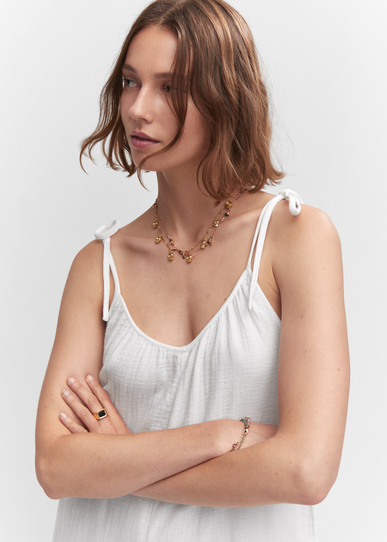 Textured jumpsuit with bows - Details of the article 1