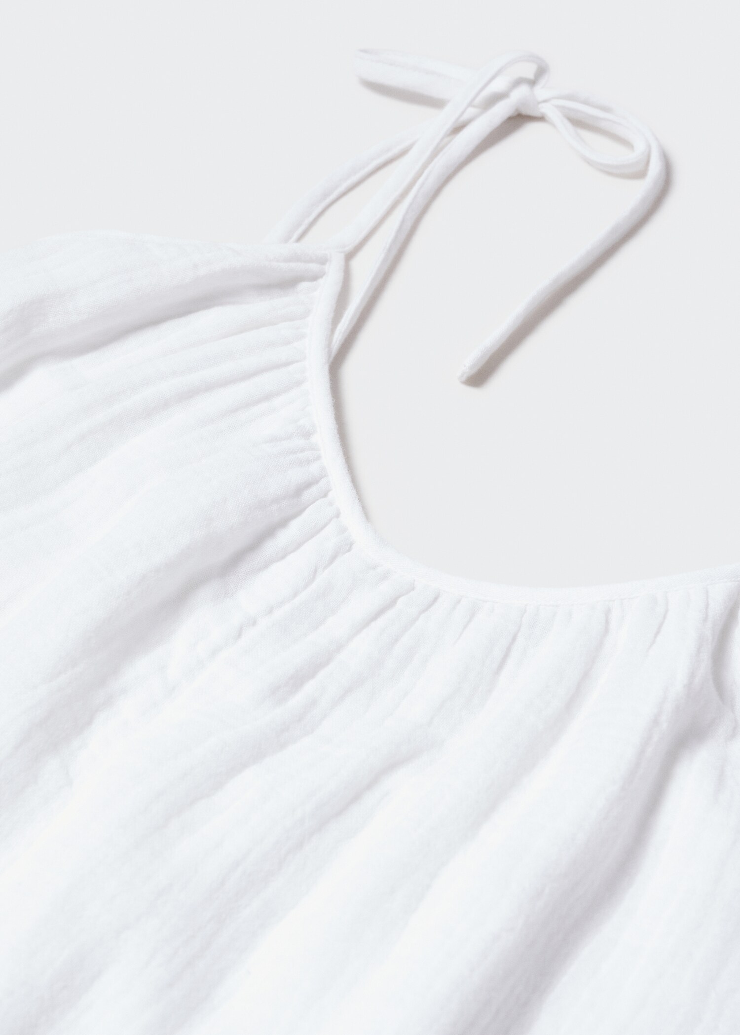 Textured jumpsuit with bows - Details of the article 8