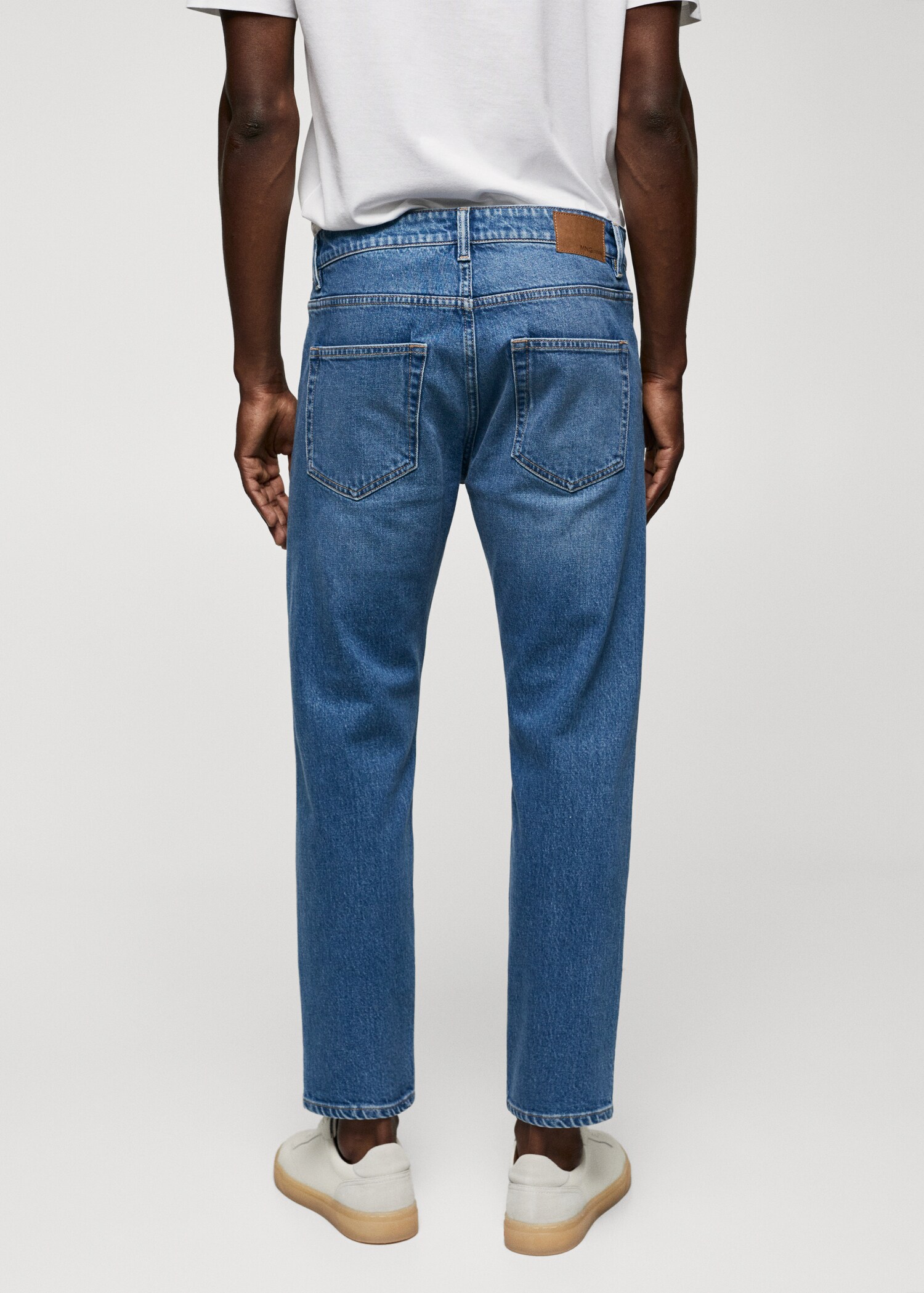 Jeans Ben tapered e cropped - Verso do artigo