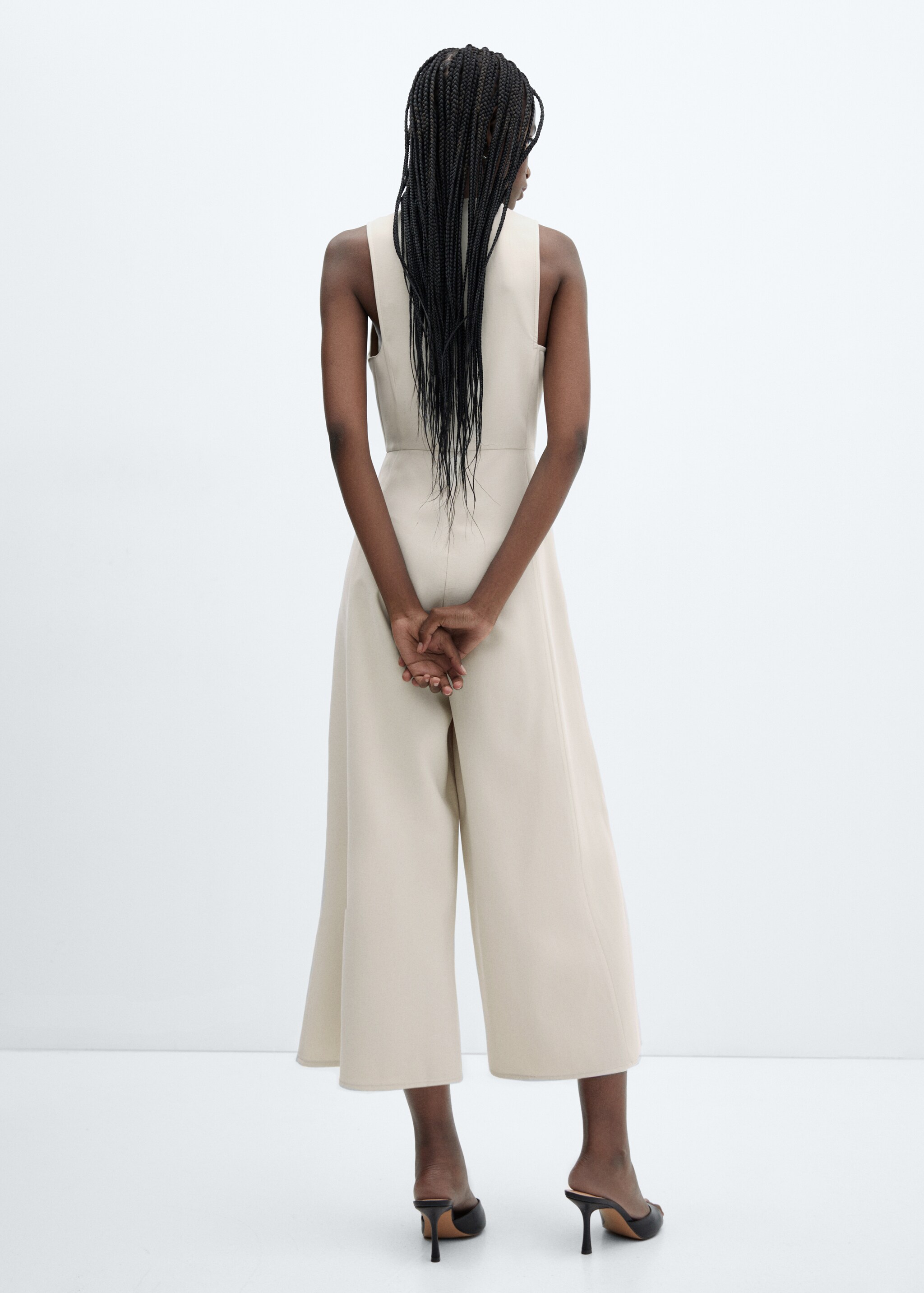 Cropped jumpsuit with straps - Reverse of the article