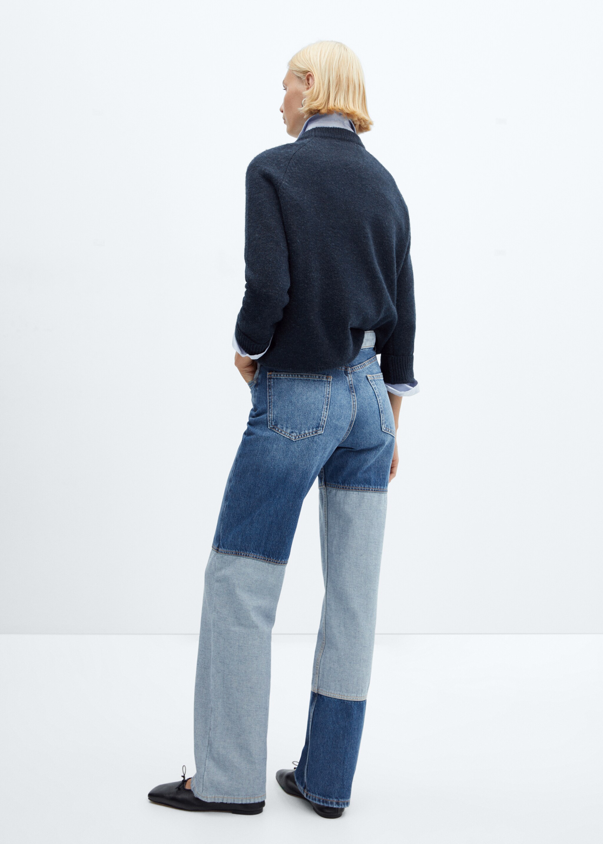 Patchworkowe jeansy z szerokimi nogawkami  - Tylna strona artykułu