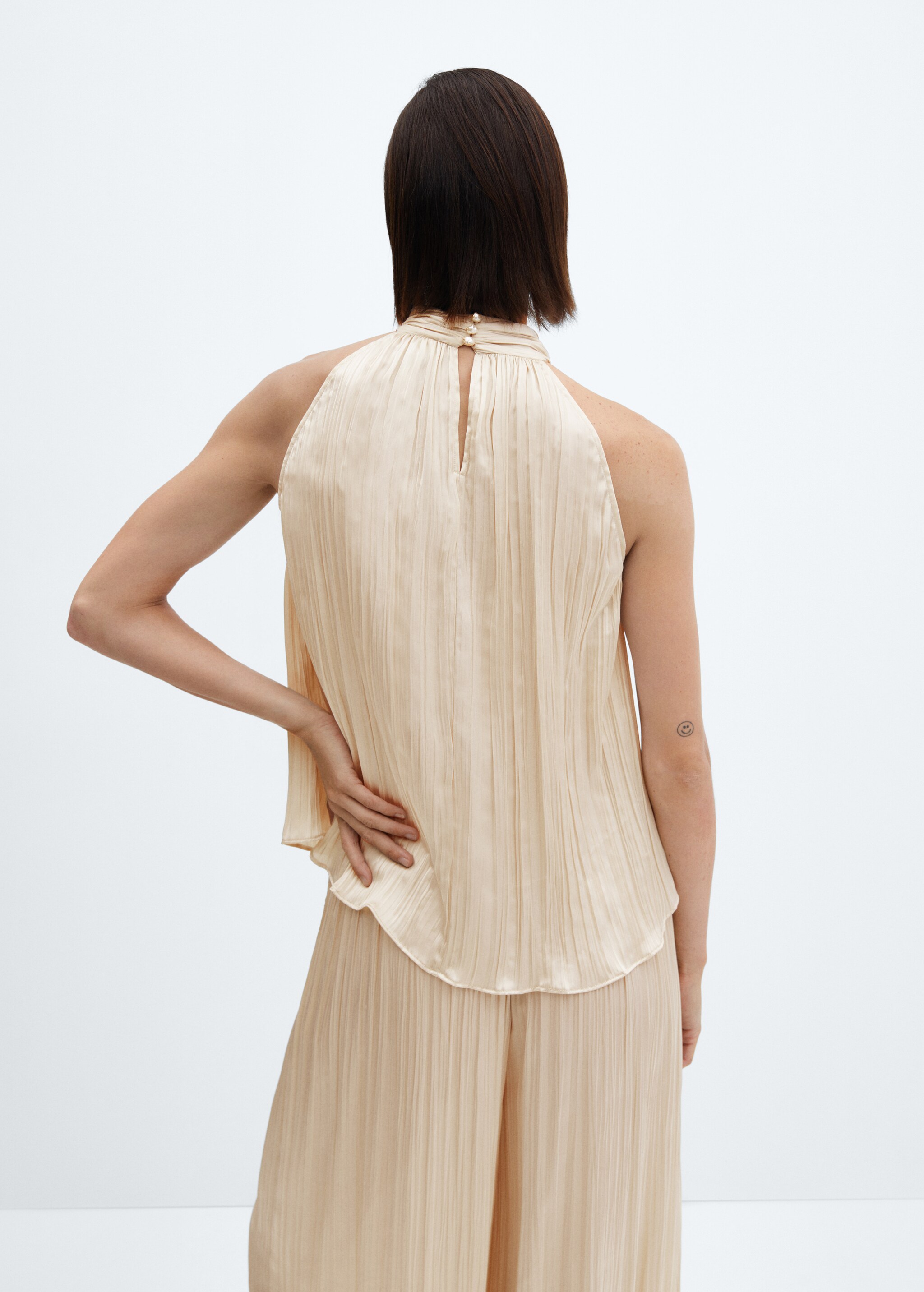 Halter-neck pleated top - Reverse of the article
