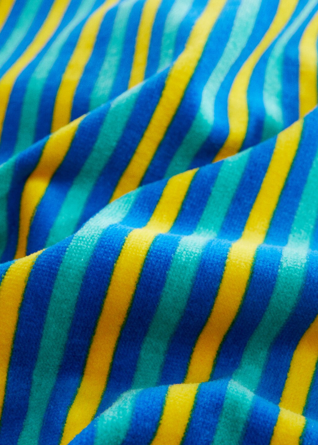 Multi-coloured striped beach towel