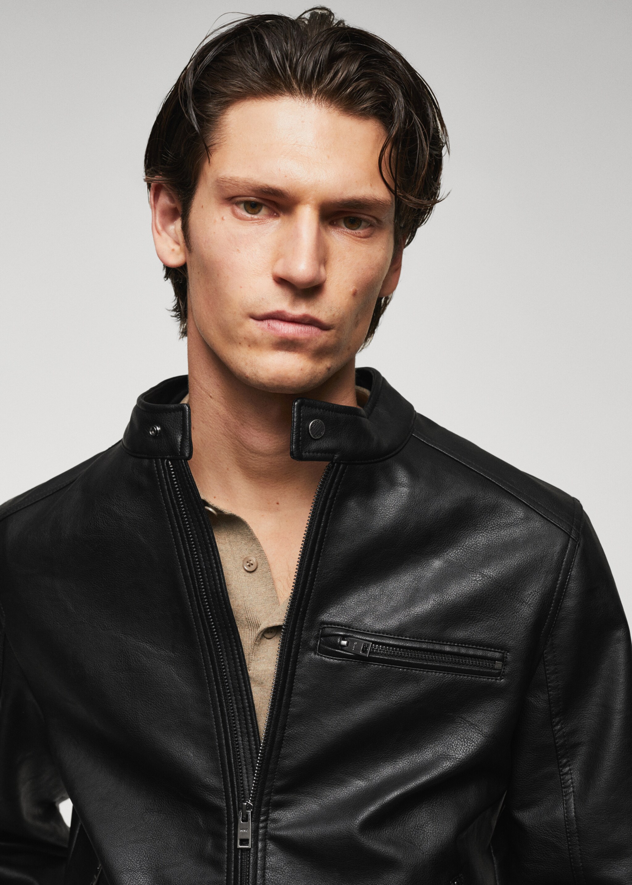 Faux-leather jacket with zips - Details of the article 1, Black. Ref: 57022506-00.
