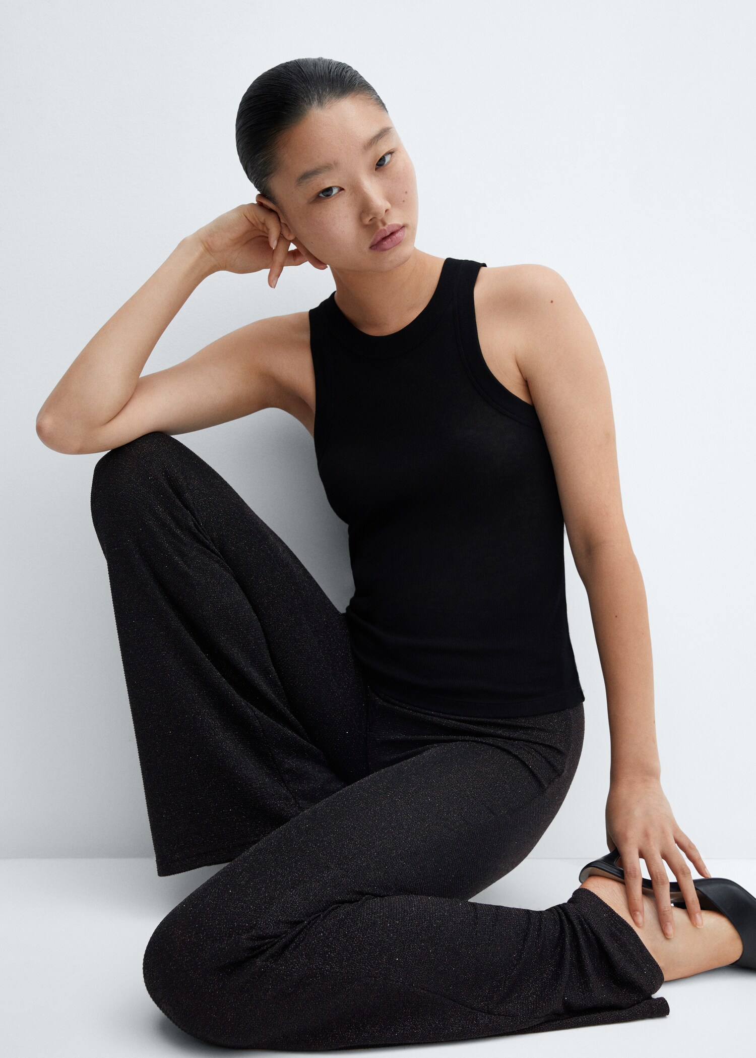 Shiny flared trousers - Details of the article 2