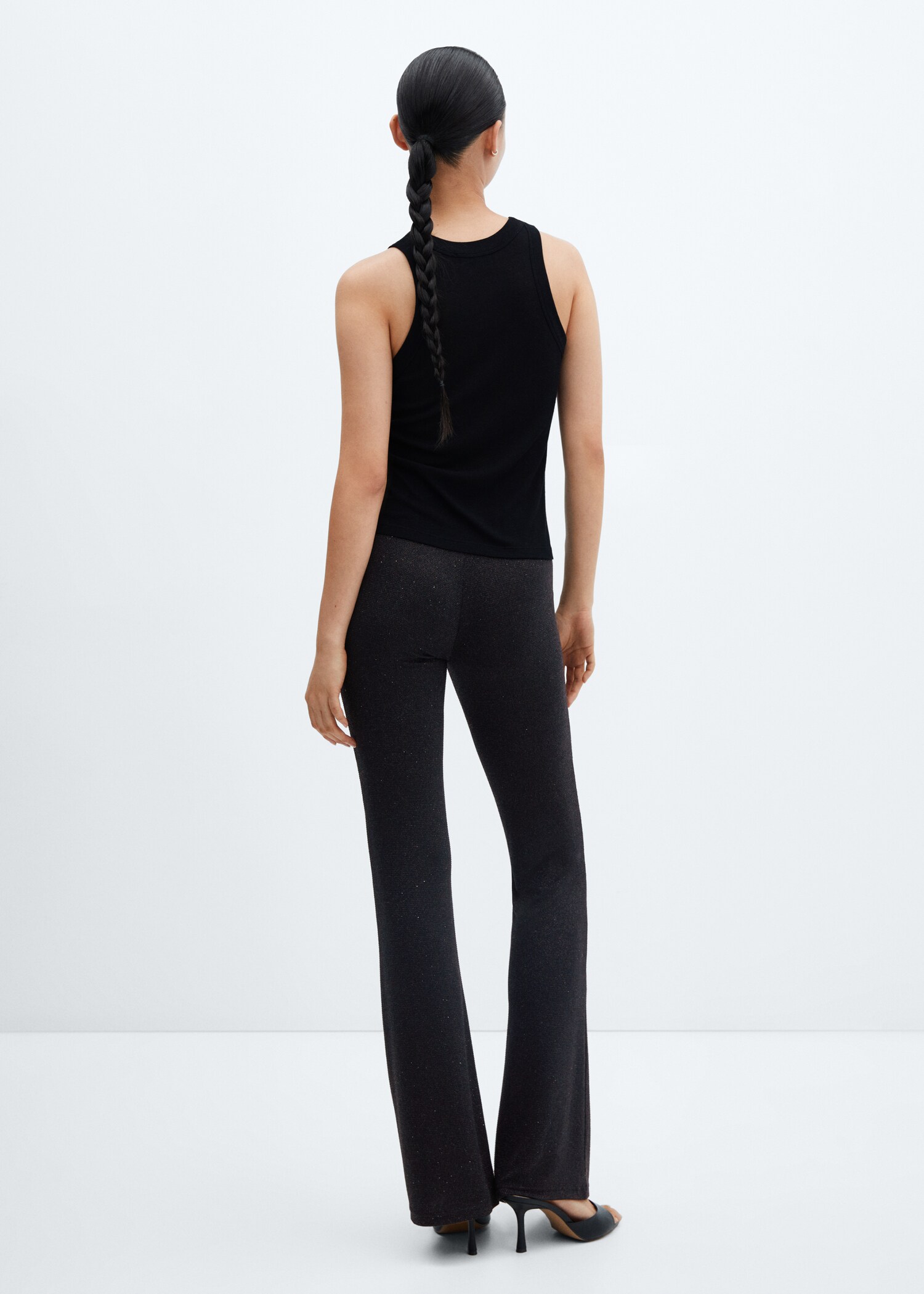 Shiny flared trousers - Reverse of the article