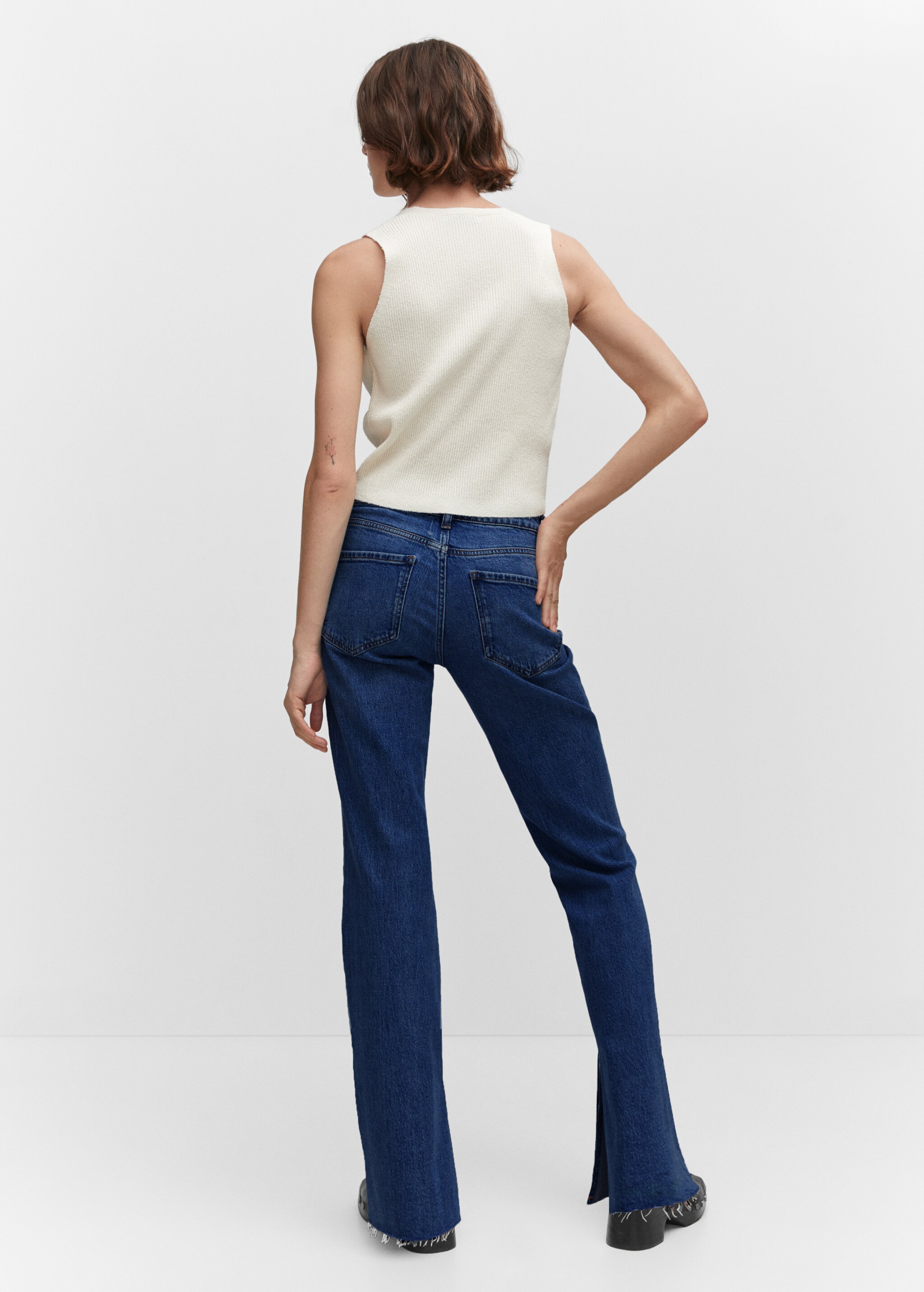 Mid-waist flared jeans with slits - Reverse of the article