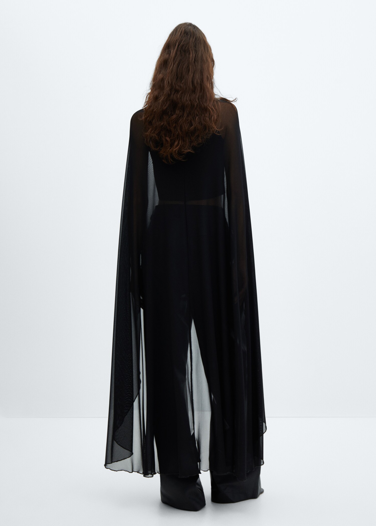 Asymmetric semi-transparent cape - Reverse of the article