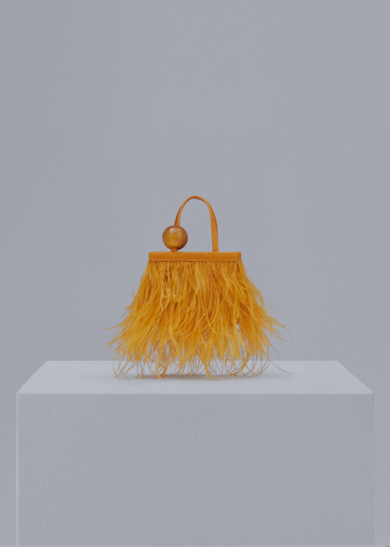 Sac cuir orné de plumes - Article sans modèle