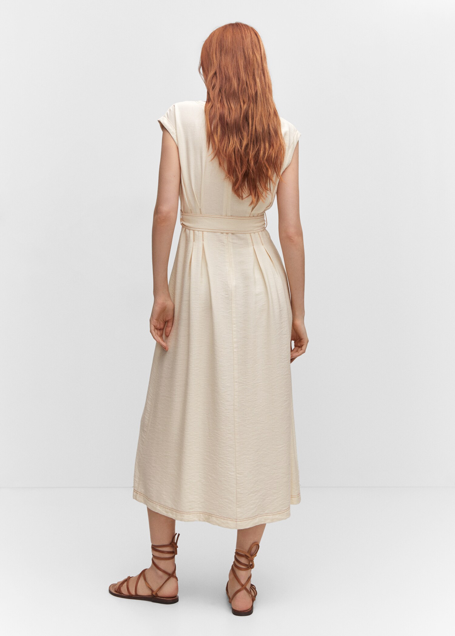 Dress with seams, belt and bow - Reverse of the article
