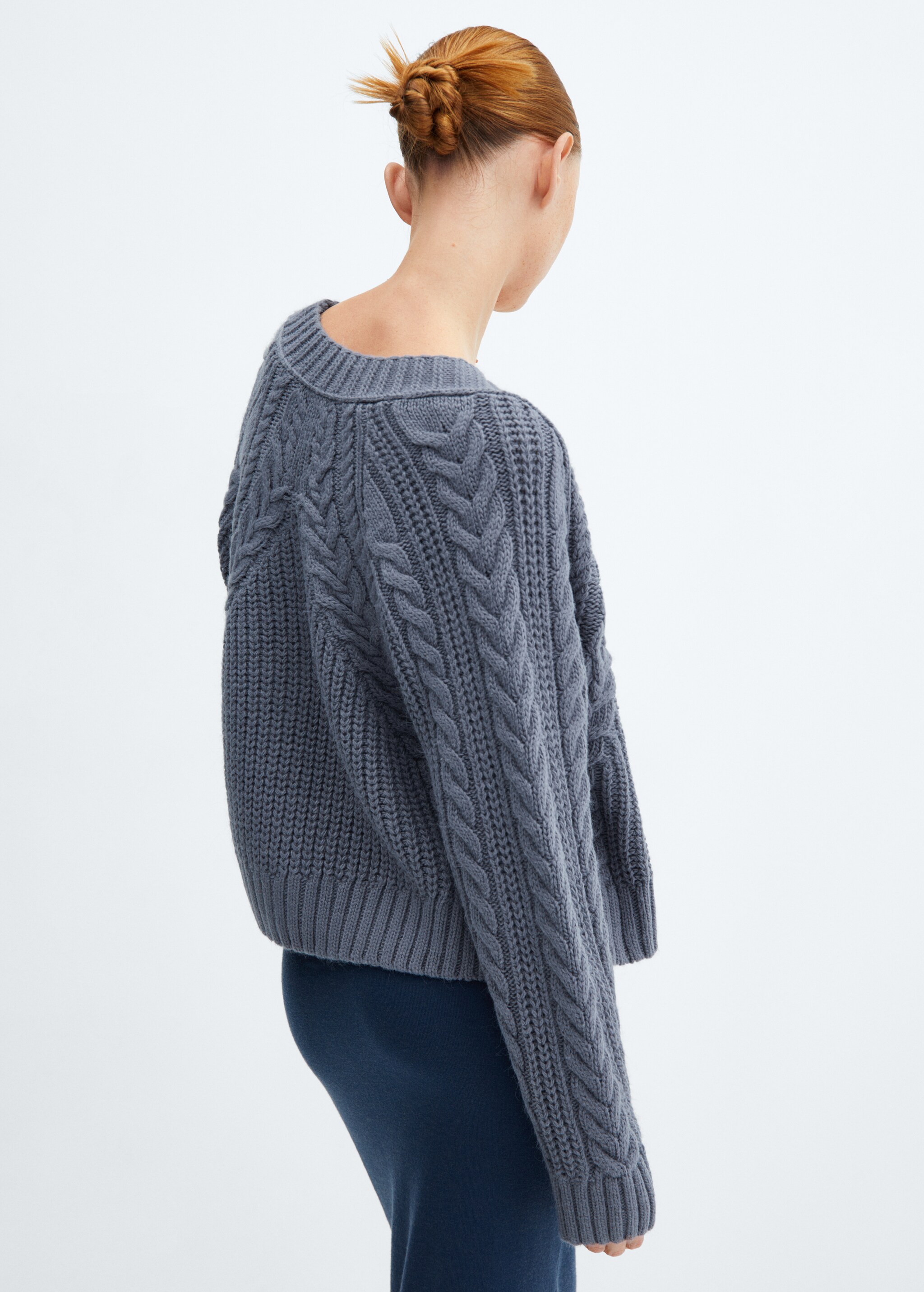 Buttoned knit braided cardigan - Reverse of the article