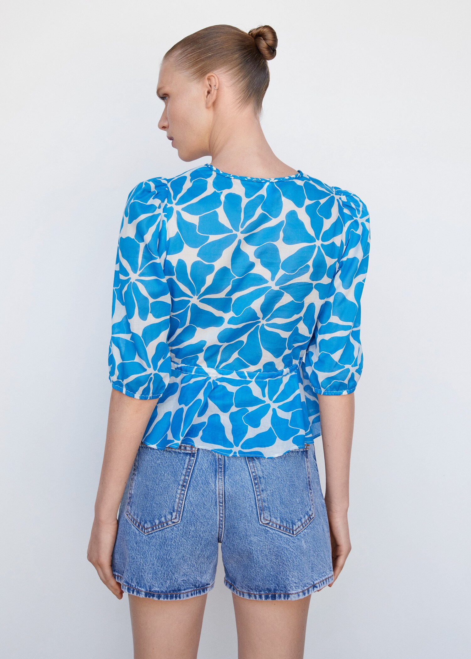 Double-breasted blouse with bow - Reverse of the article