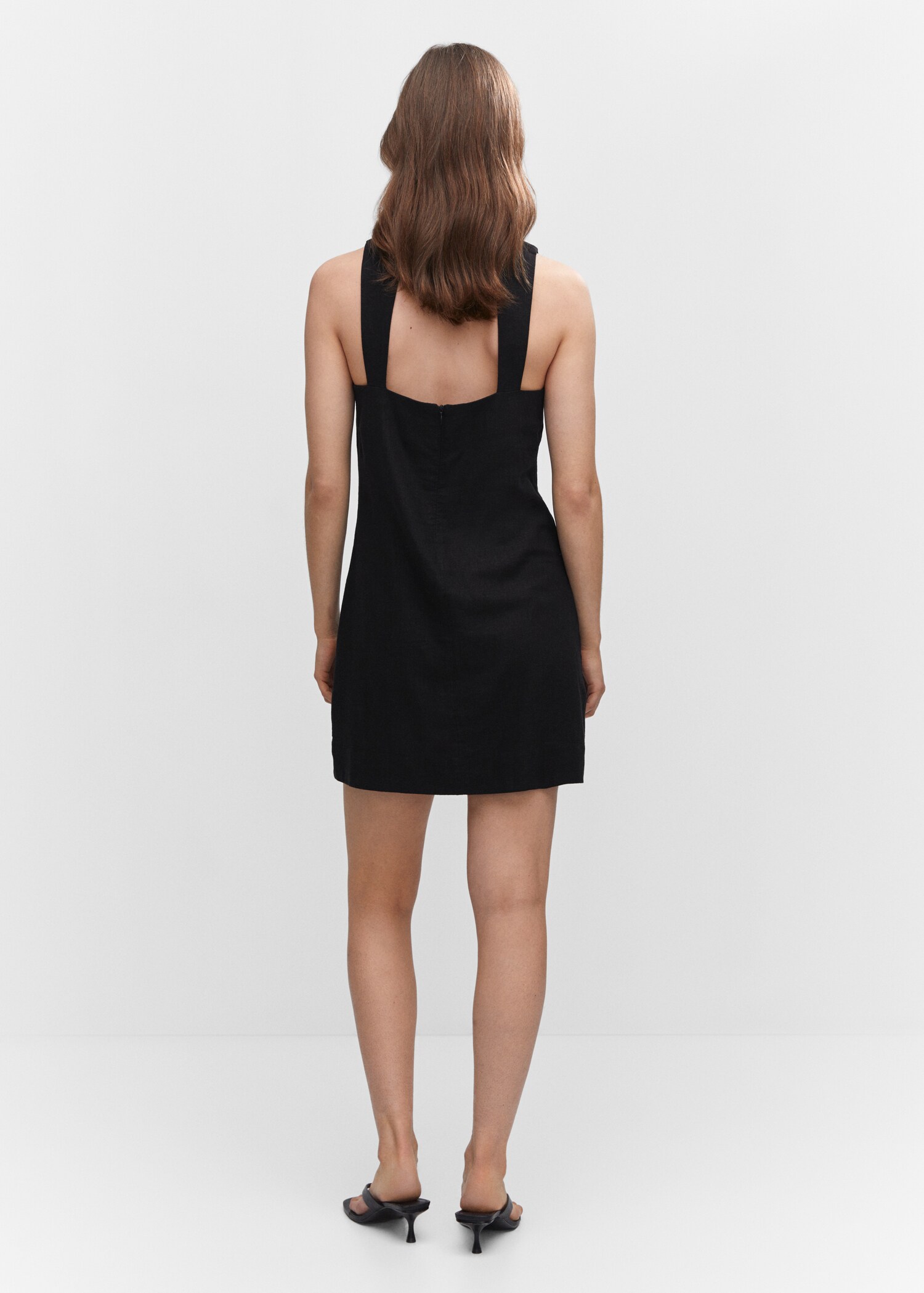Linen dress with back opening - Reverse of the article