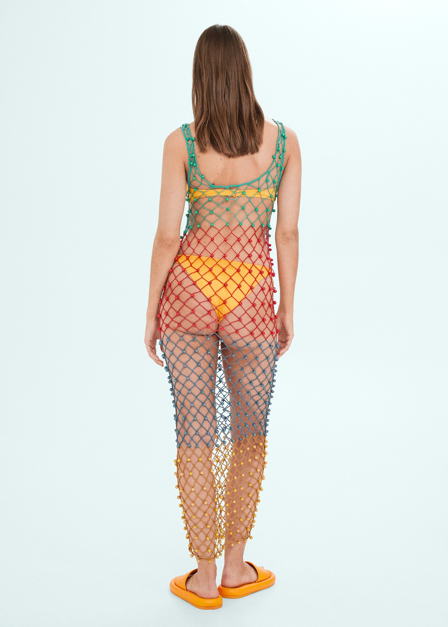 Multi-colored net dress with beads - Reverse of the article