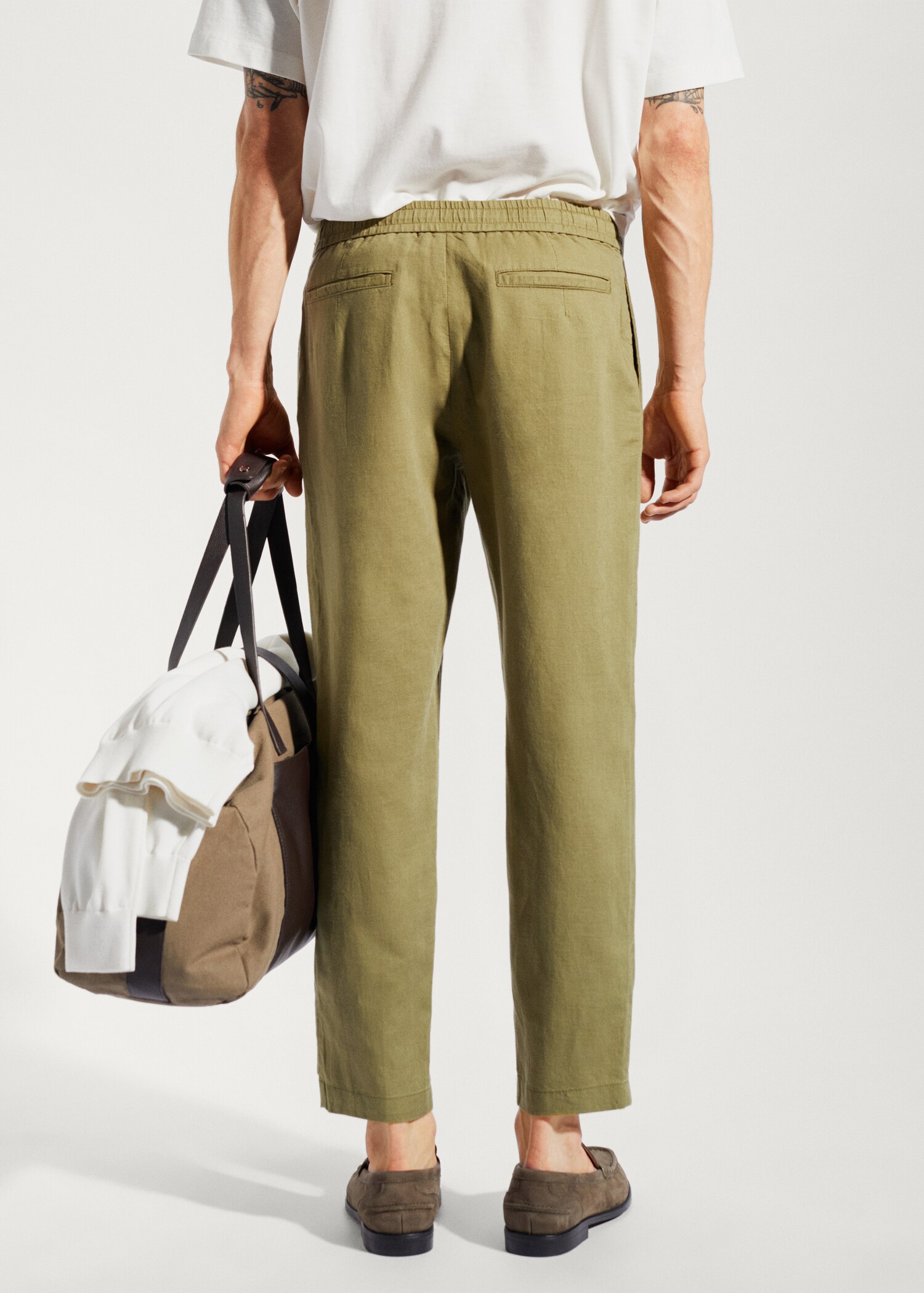 Slim-fit trousers with drawstring  - Reverse of the article