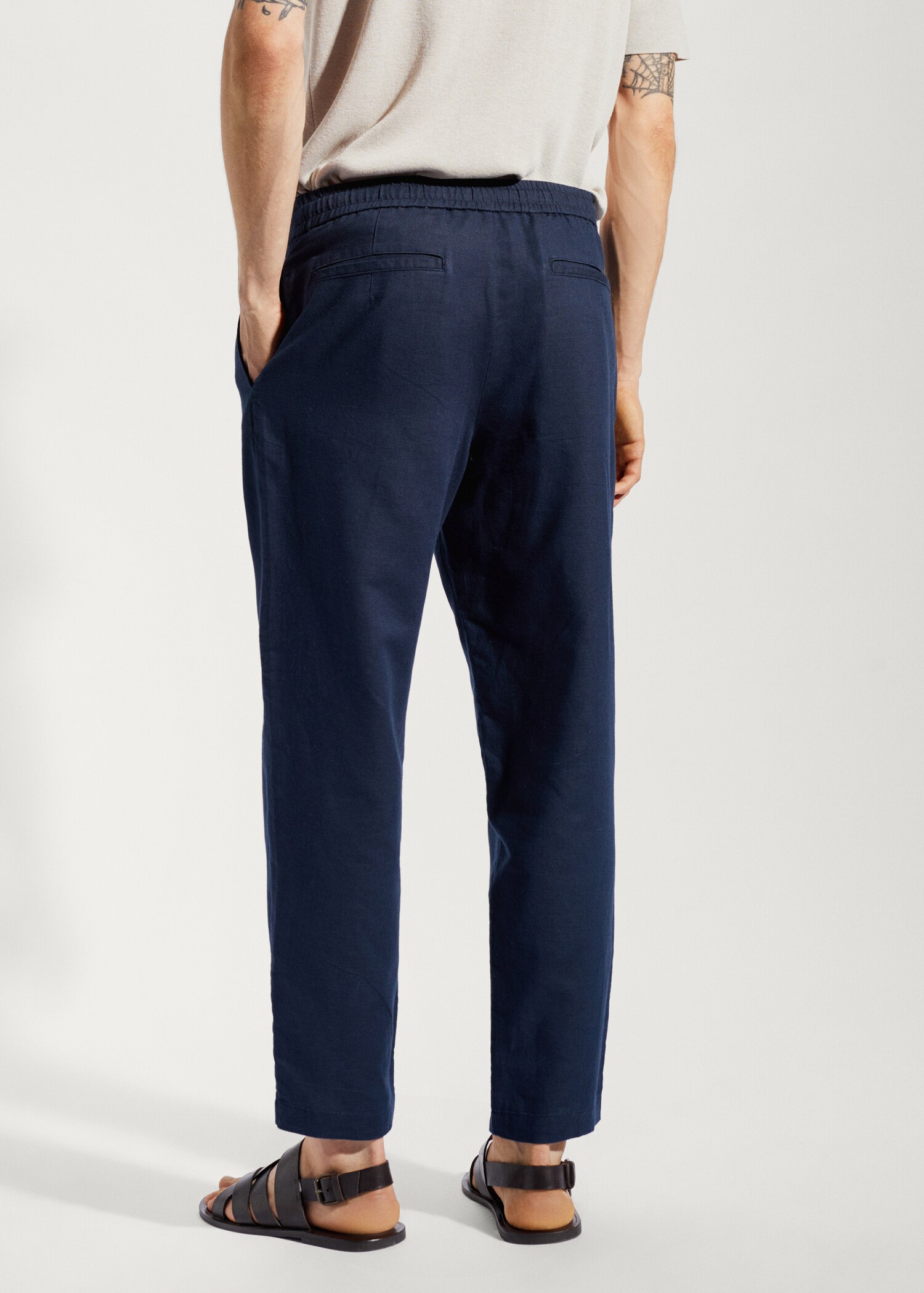 Slim-fit trousers with drawstring  - Reverse of the article