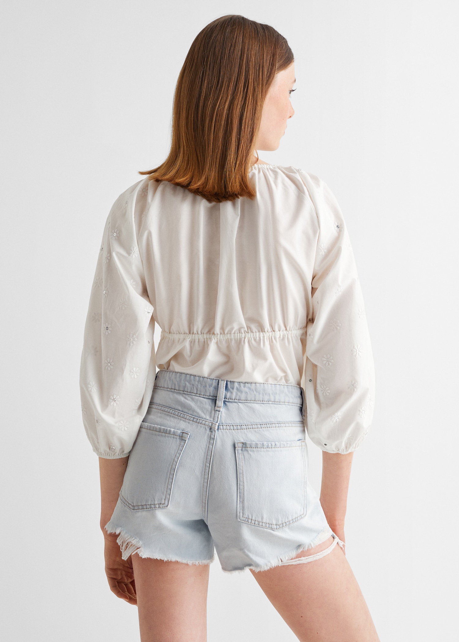 Broken denim shorts - Reverse of the article