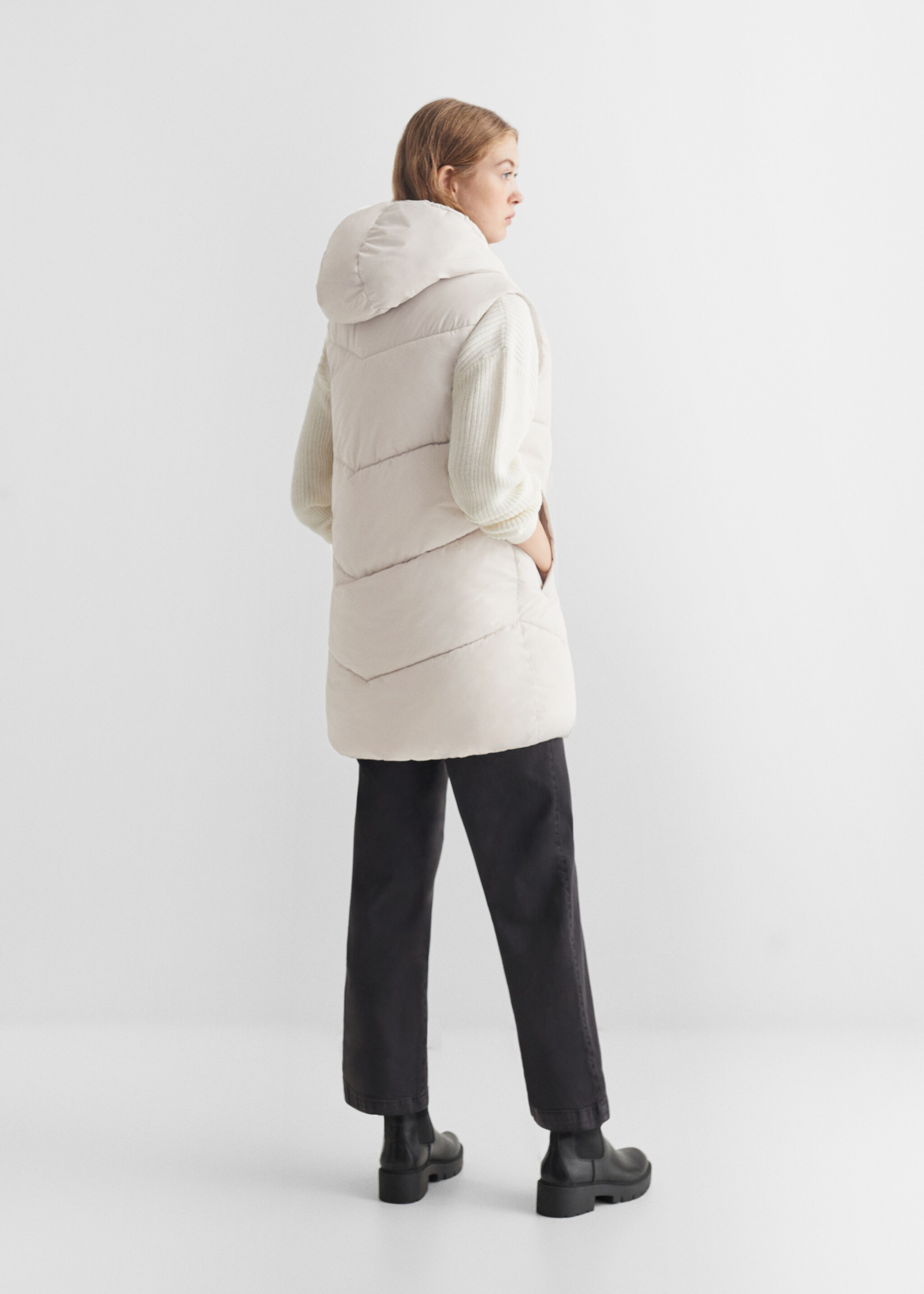 Long quilted gilet - Reverse of the article