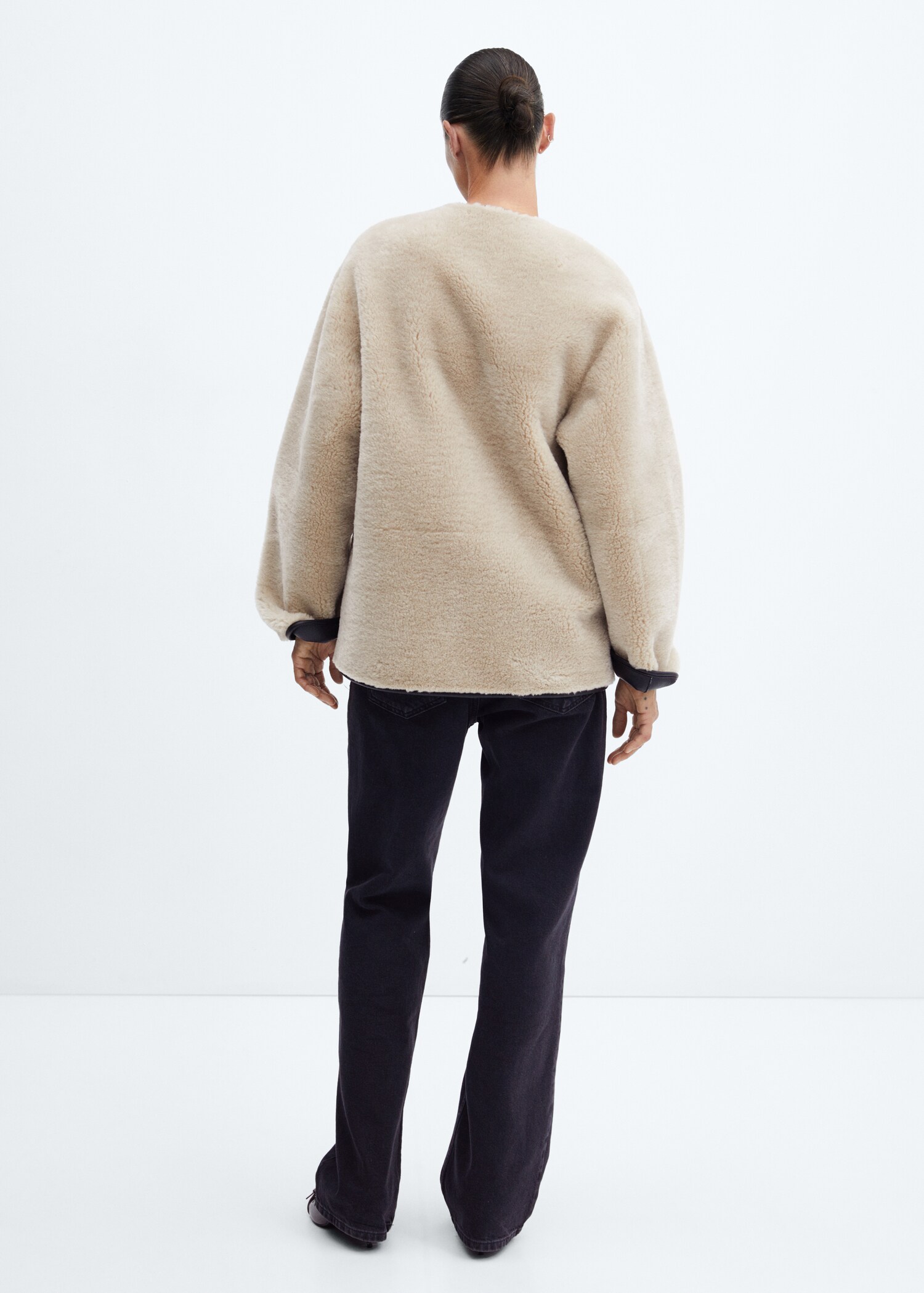 Fur-effect coat with appliqués - Reverse of the article