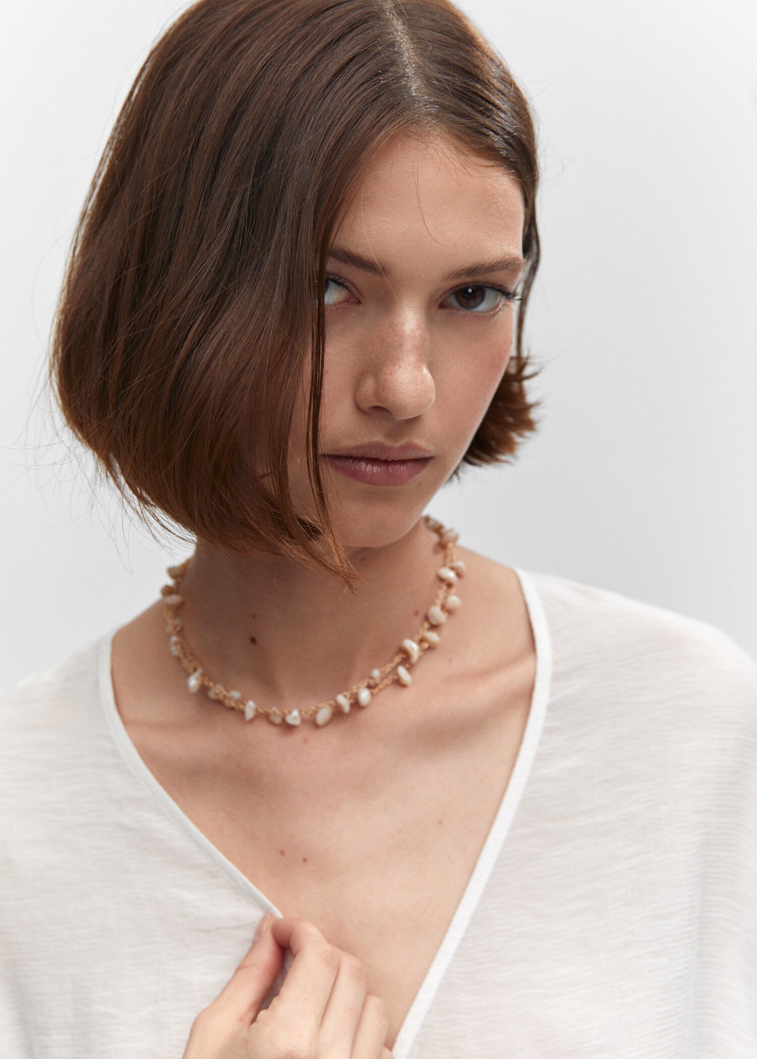 Flared-sleeve blouse with bow - Details of the article 1