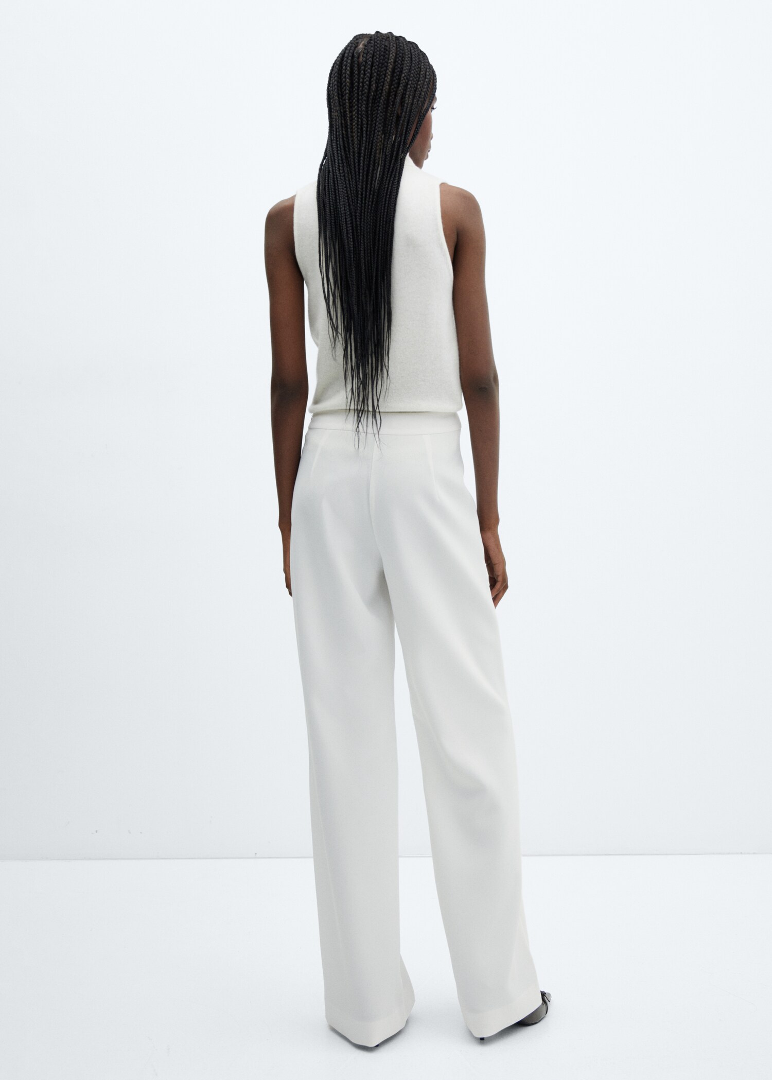 Trousers with waist button  - Reverse of the article