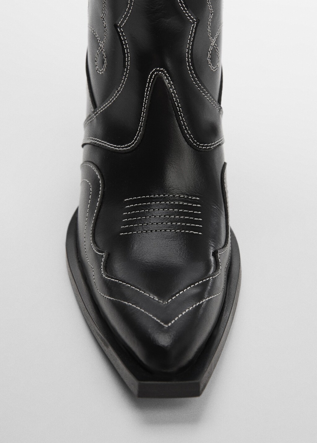 Leather cowboy ankle boots with seams