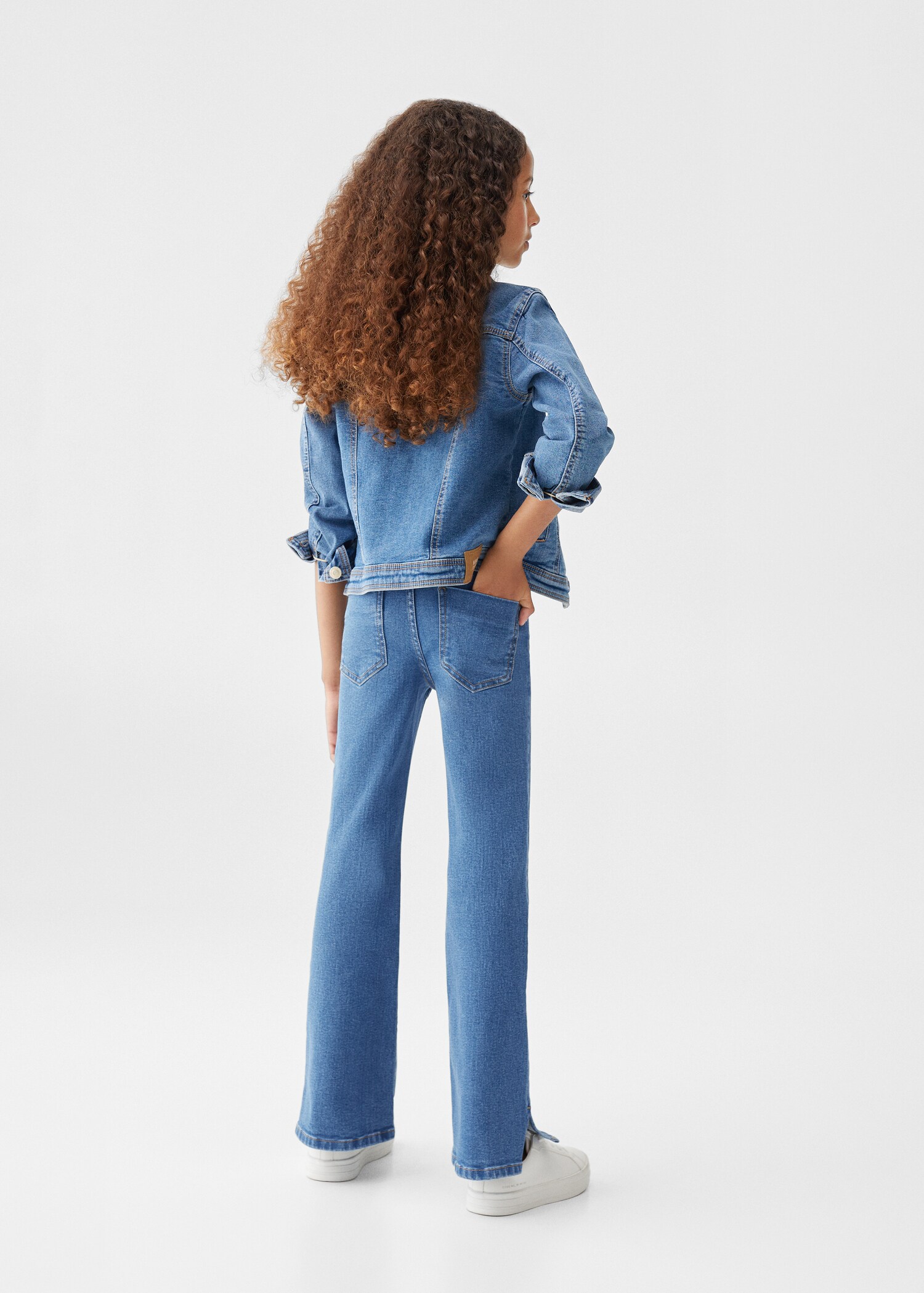 Jeans flare aberturas - Reverso del artículo