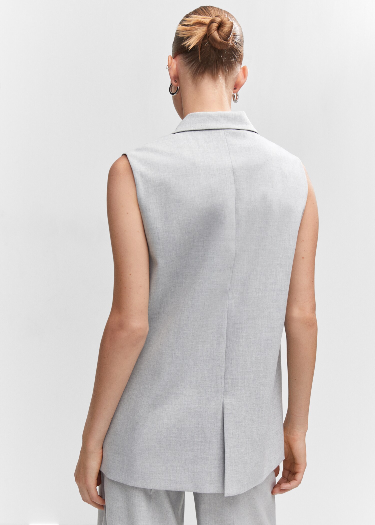 Long gilet with openings - Reverse of the article
