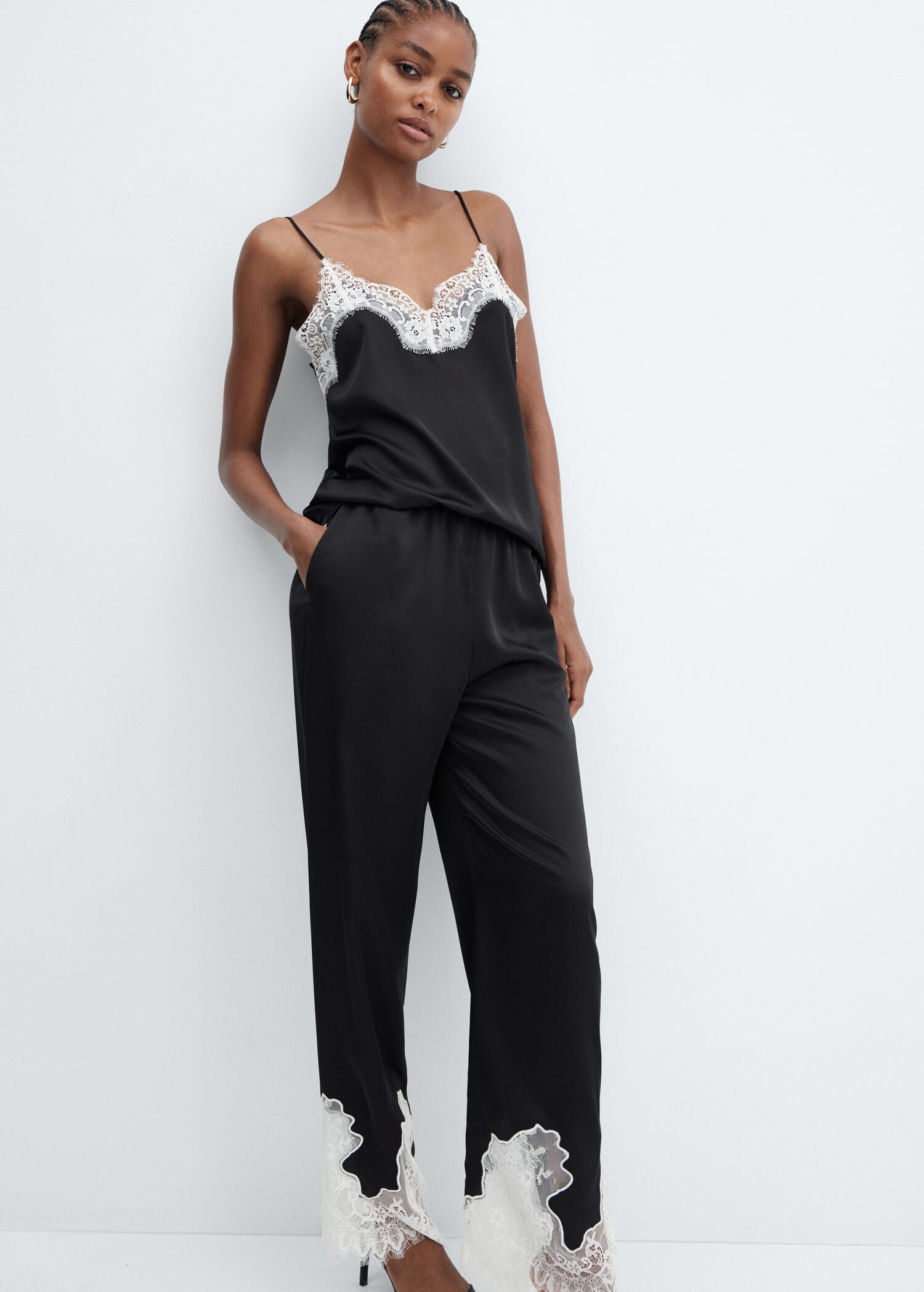 Trousers with lace hem detail