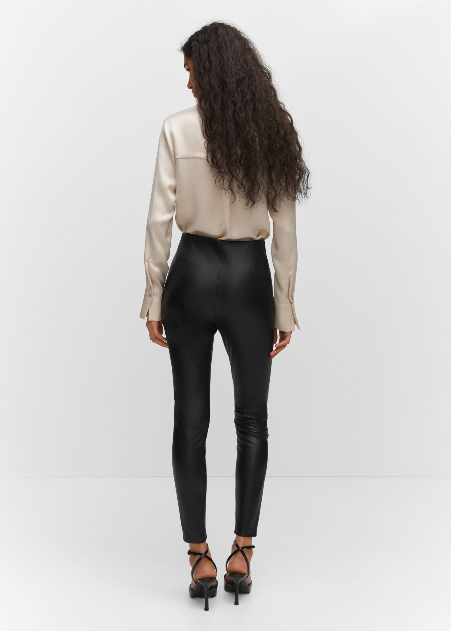 Leather-effect elastic waist trousers | MANGO
