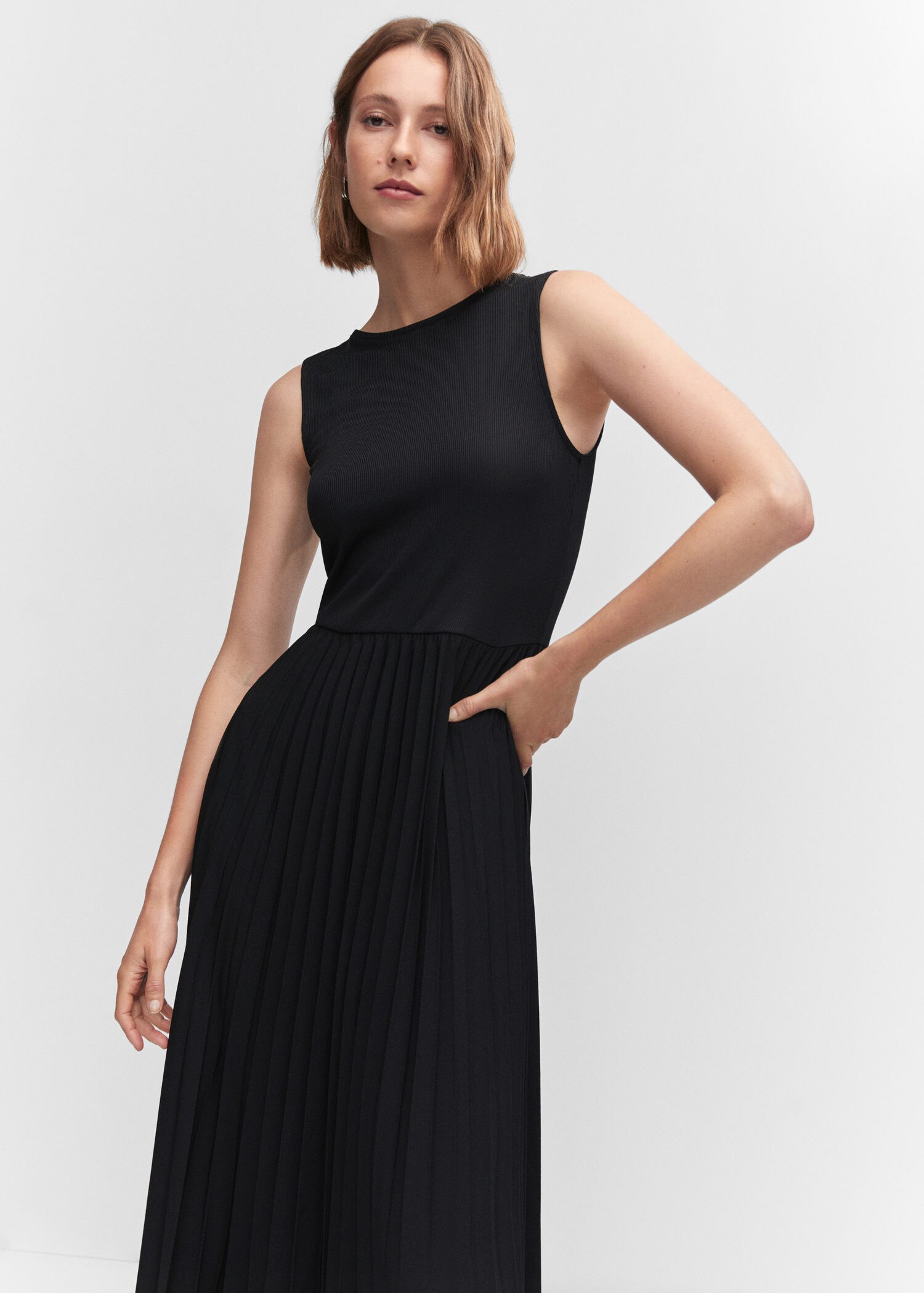 Ribbed dress with pleated skirt | MANGO