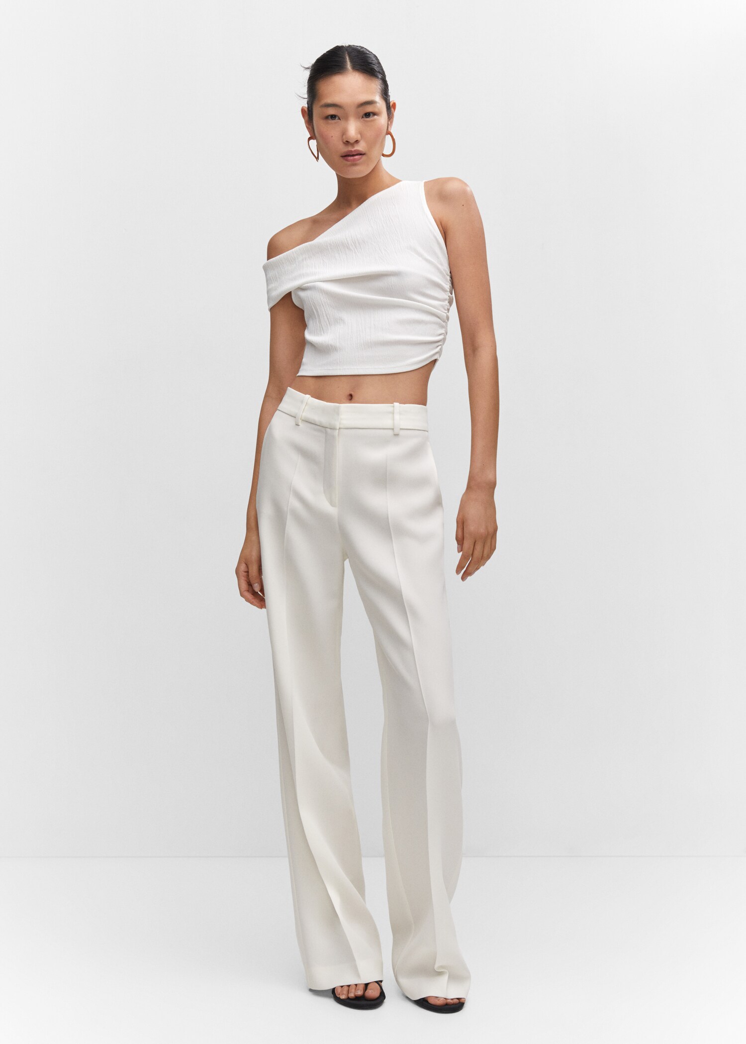 Asymmetrical textured top - General plane
