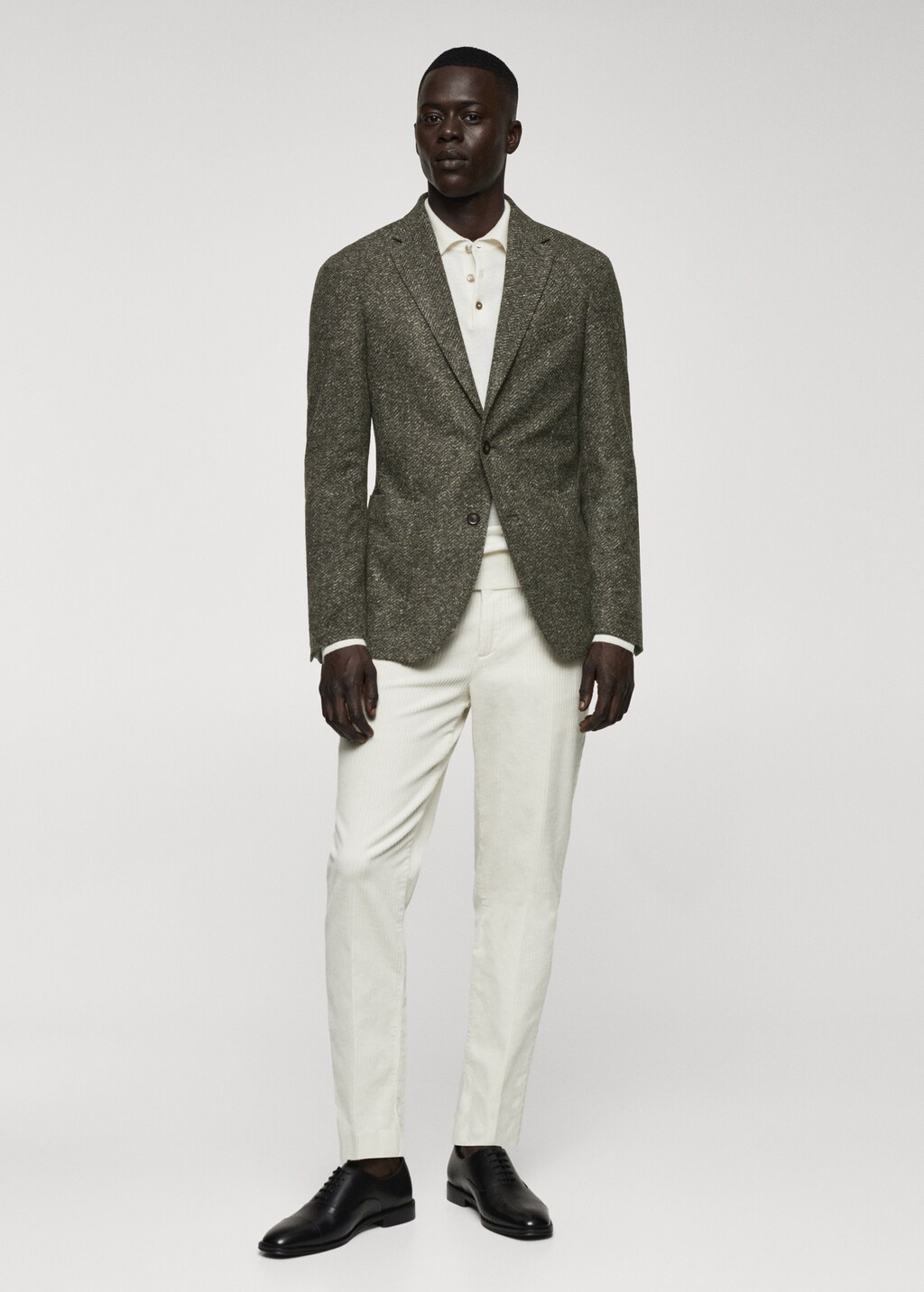 Herringbone print virgin wool blazer - Men | MANGO Niger