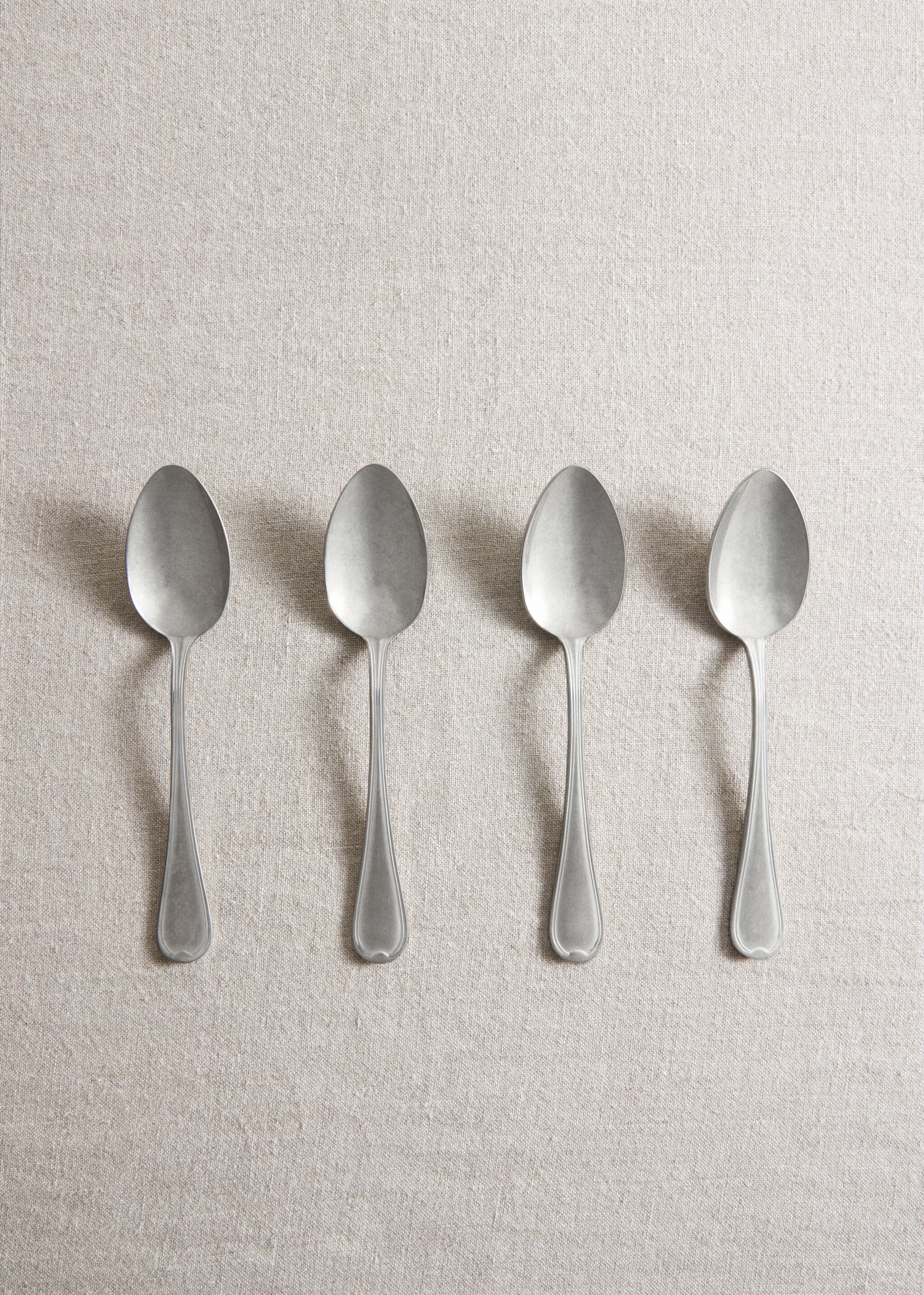 Pack of 4 old silver dessert spoons  - General plane