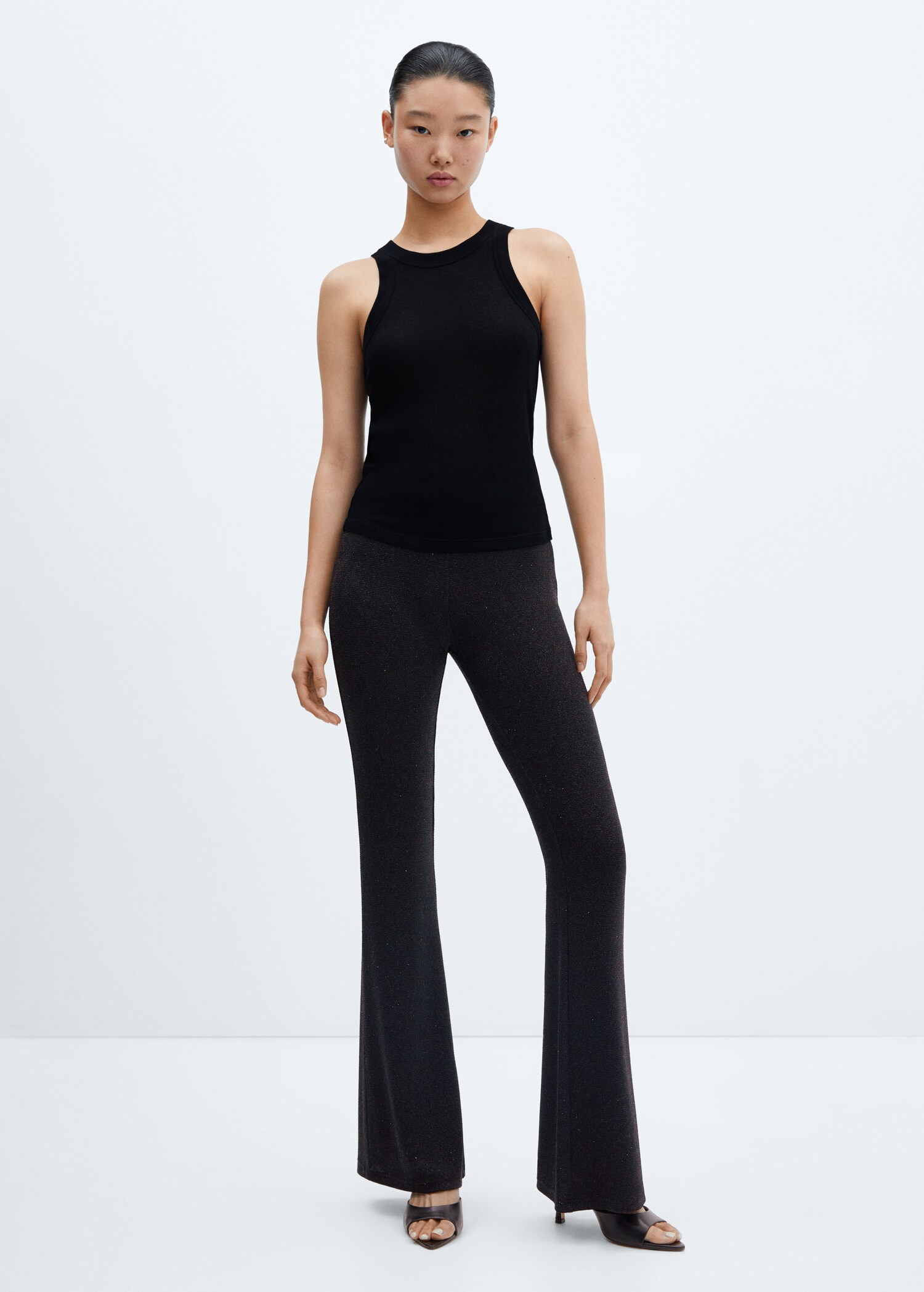 Shiny flared trousers - General plane