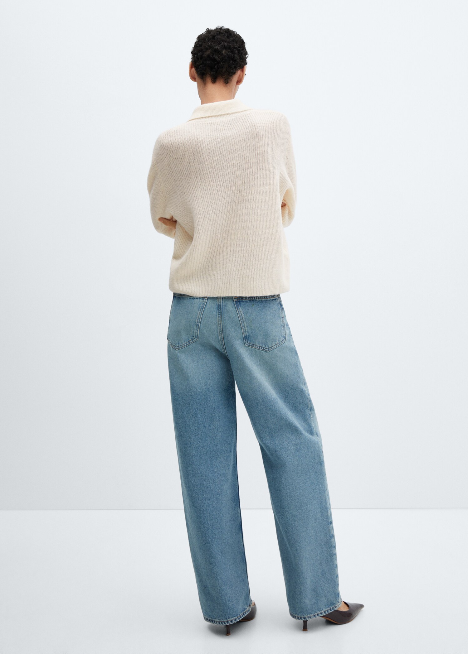 Knitted polo neck sweater - Reverse of the article