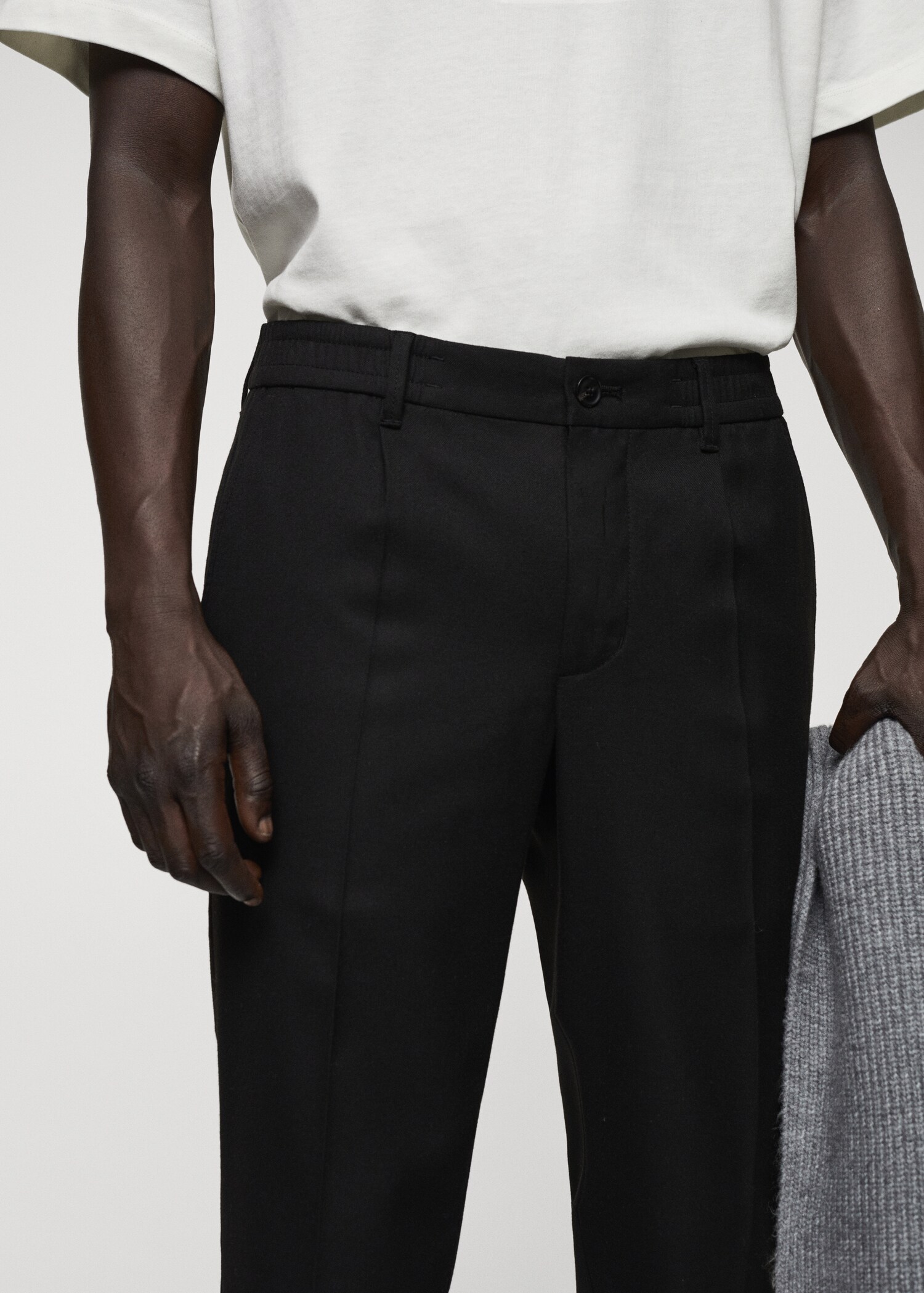Slim-fit cotton pleated trousers - Details of the article 1