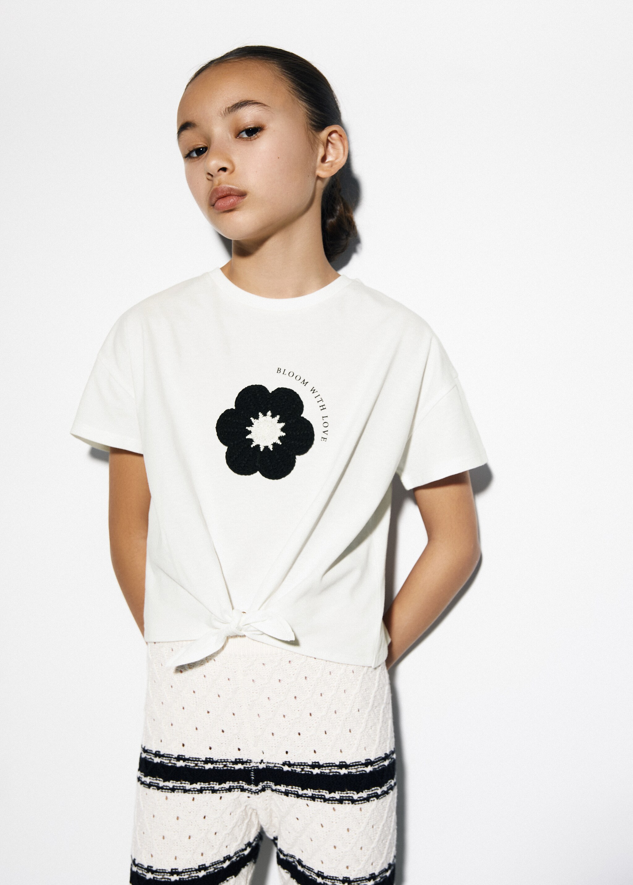 T-shirt with flower applique  - Details of the article 1