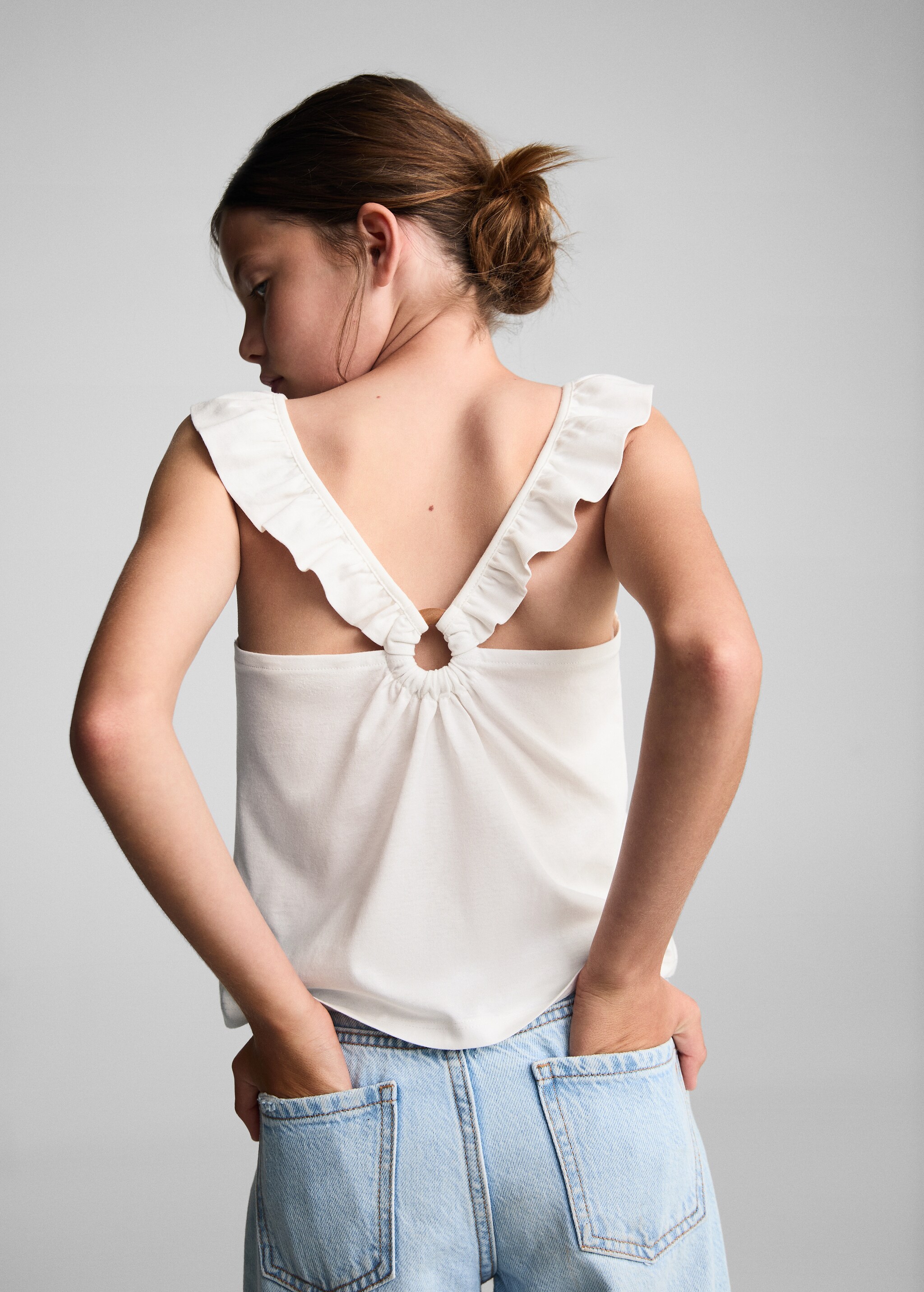 Ruffled strap top - Reverse of the article