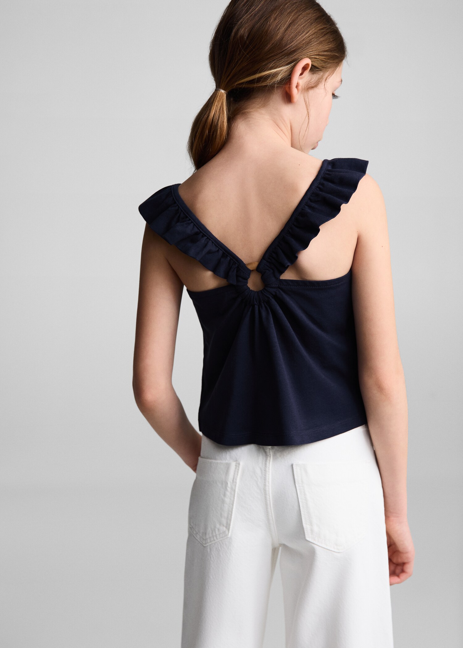 Ruffled strap top - Reverse of the article