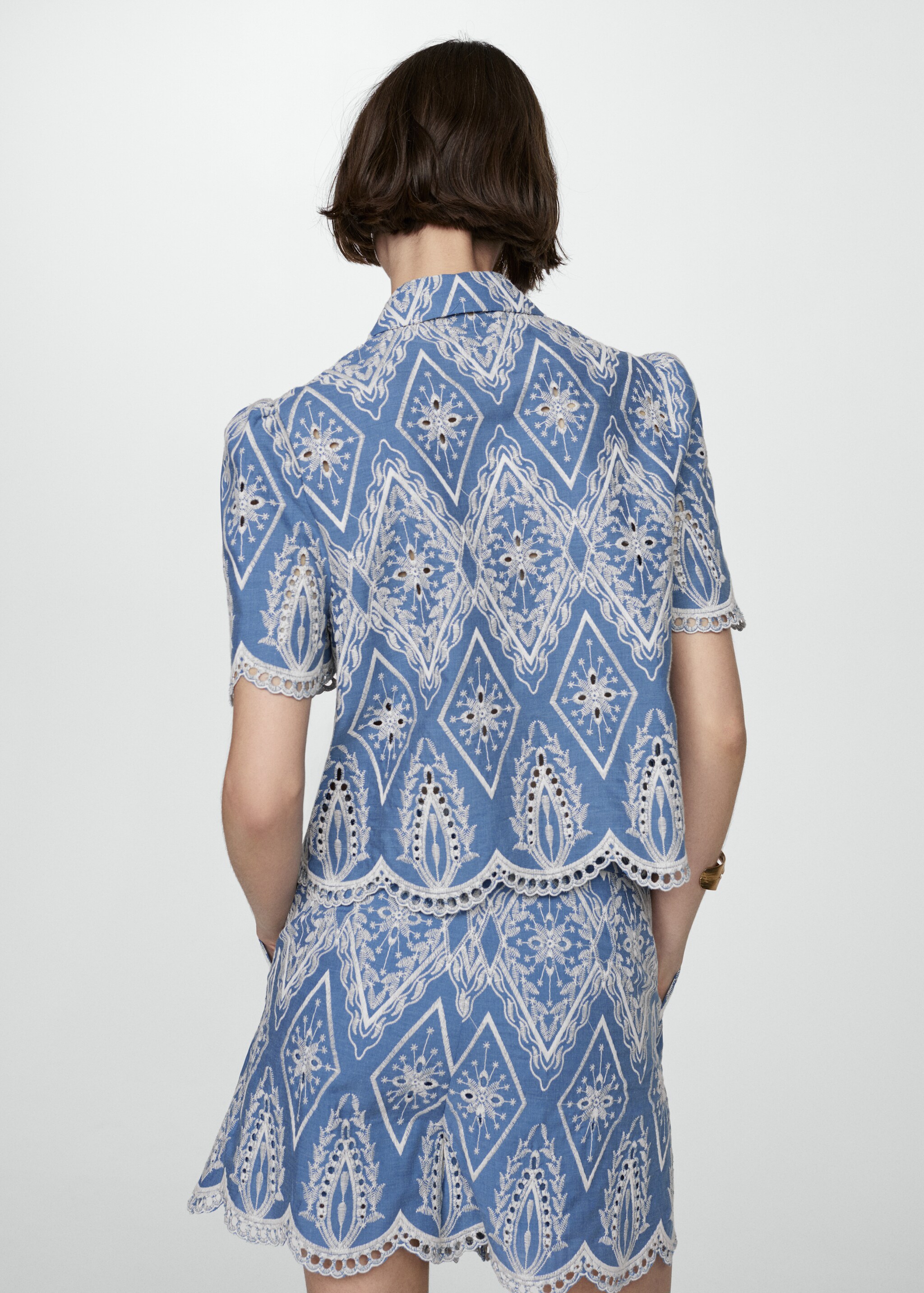Embroidered openwork shirt - Reverse of the article