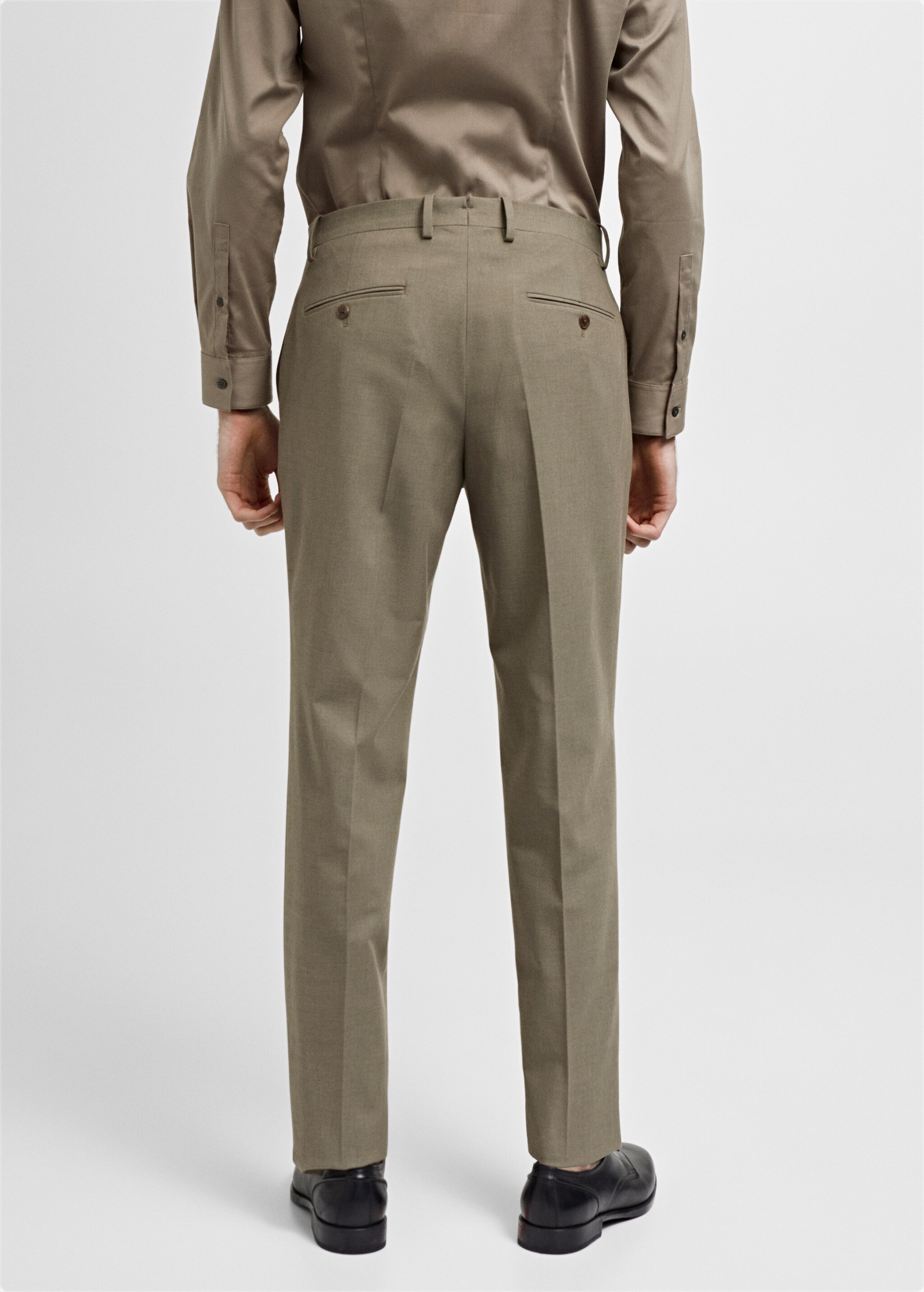 Костюмные брюки slim fit из ткани стретч - Обратная сторона изделия