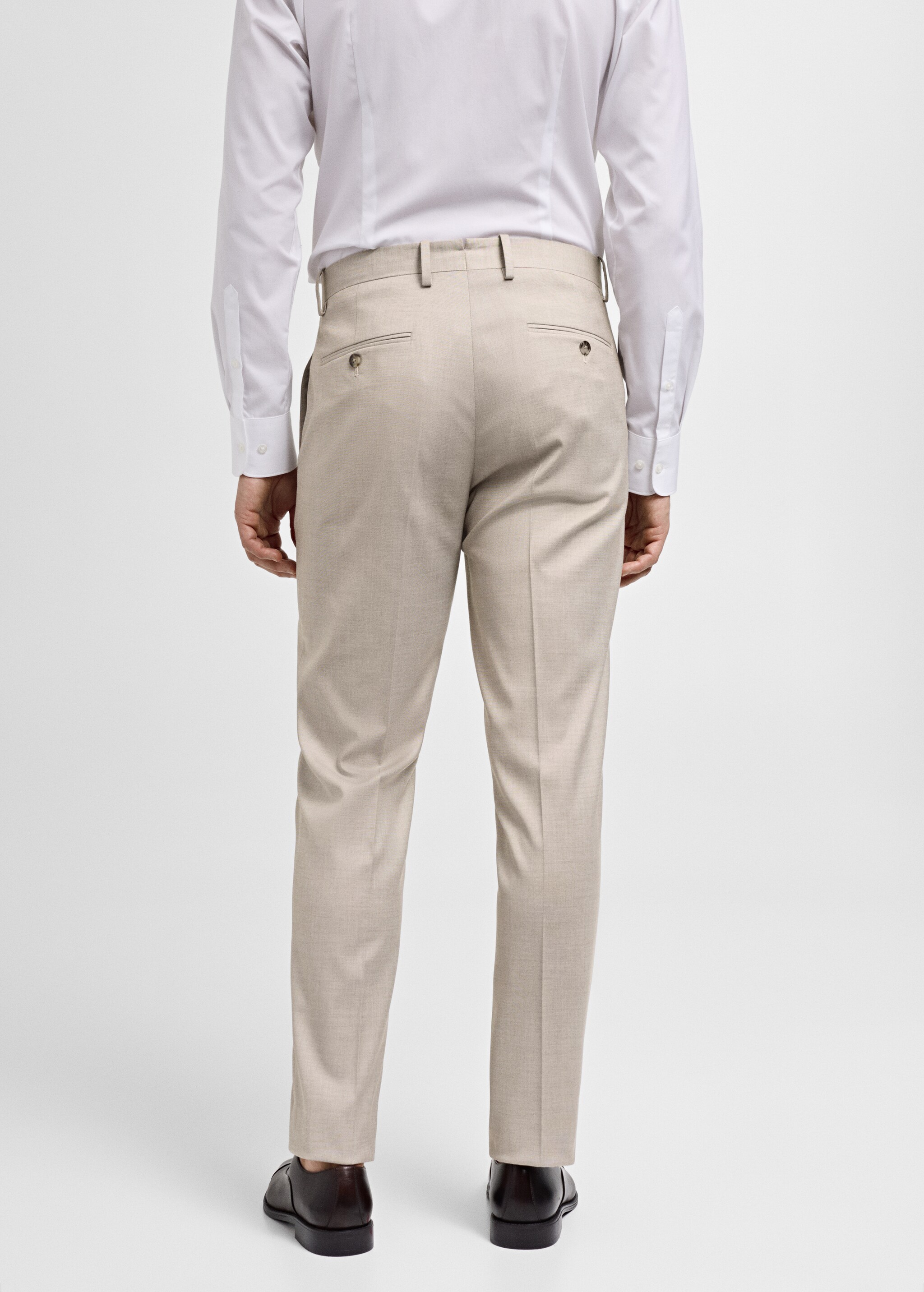 Костюмные брюки slim fit из ткани стретч - Обратная сторона изделия