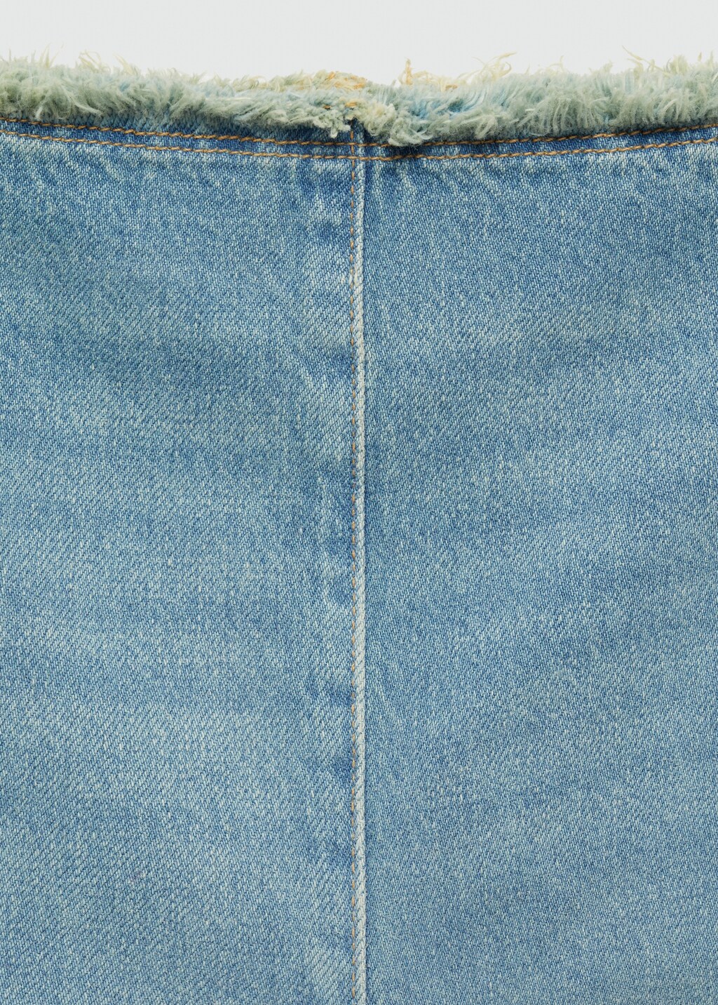 Denim skirt with frayed ends