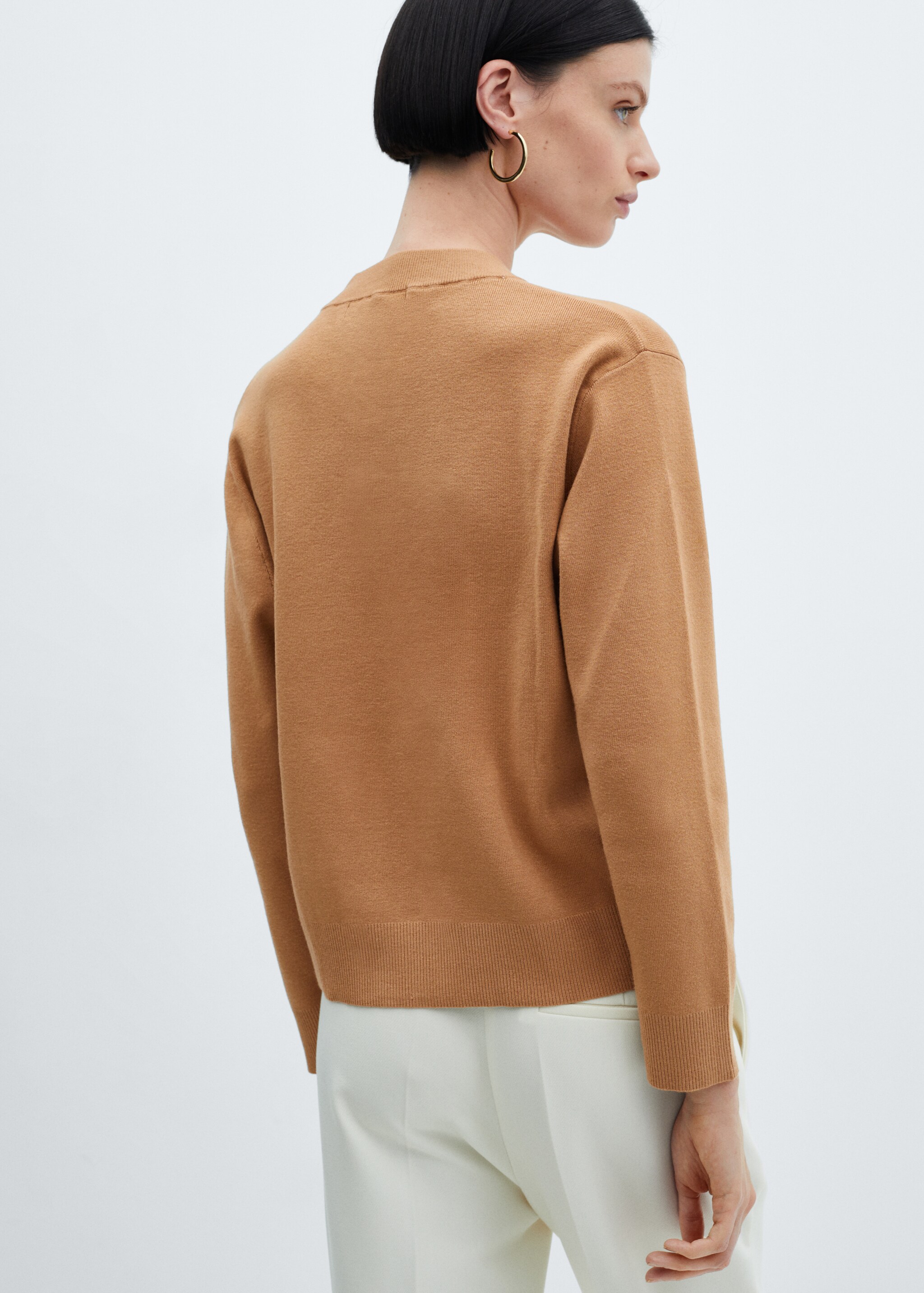 Round-neck knitted sweater  - Reverse of the article